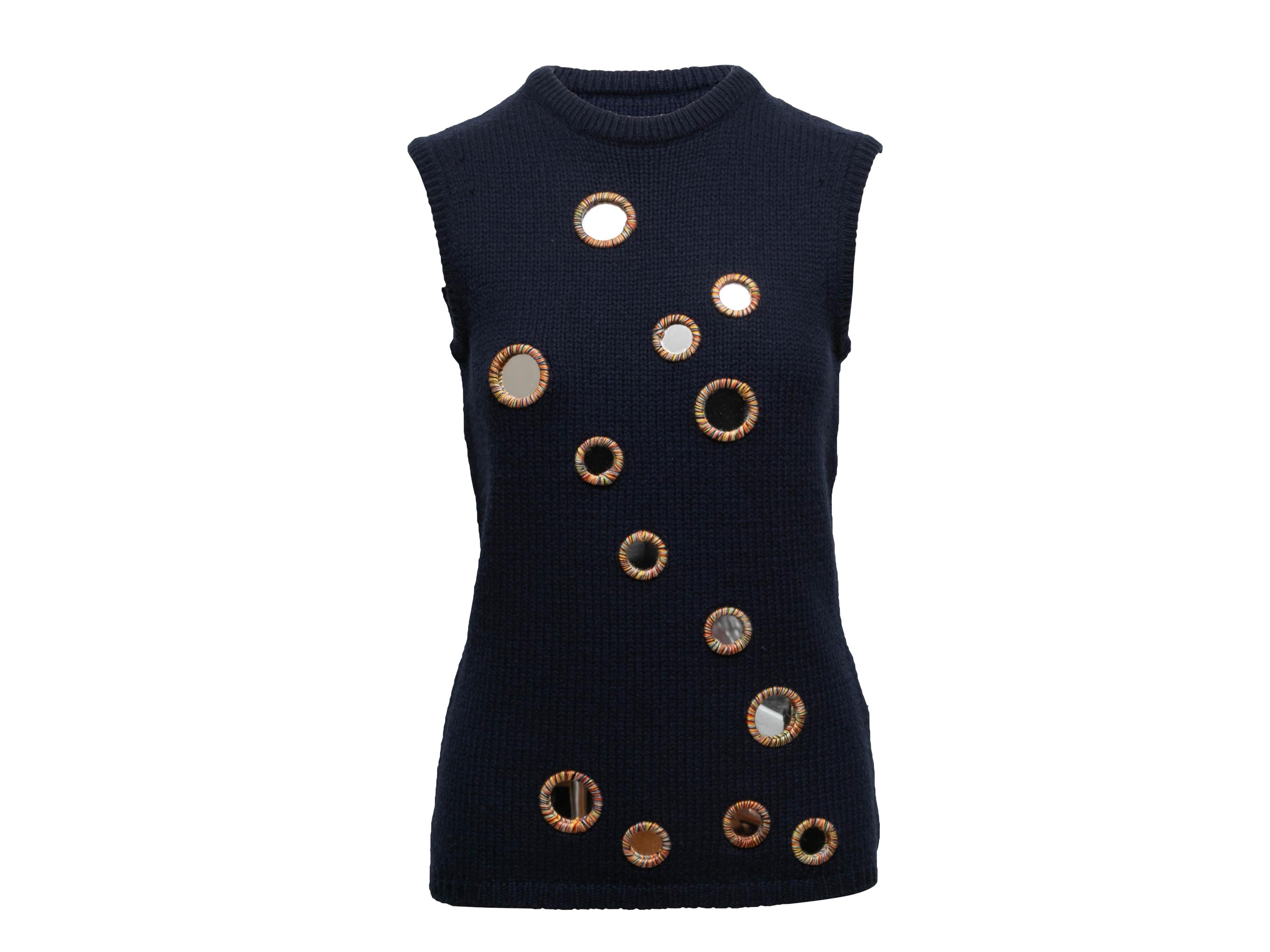 Navy wool-blend knit sleeveless top by JW Anderson. Round mirror accents throughout front. Crew neck. 33