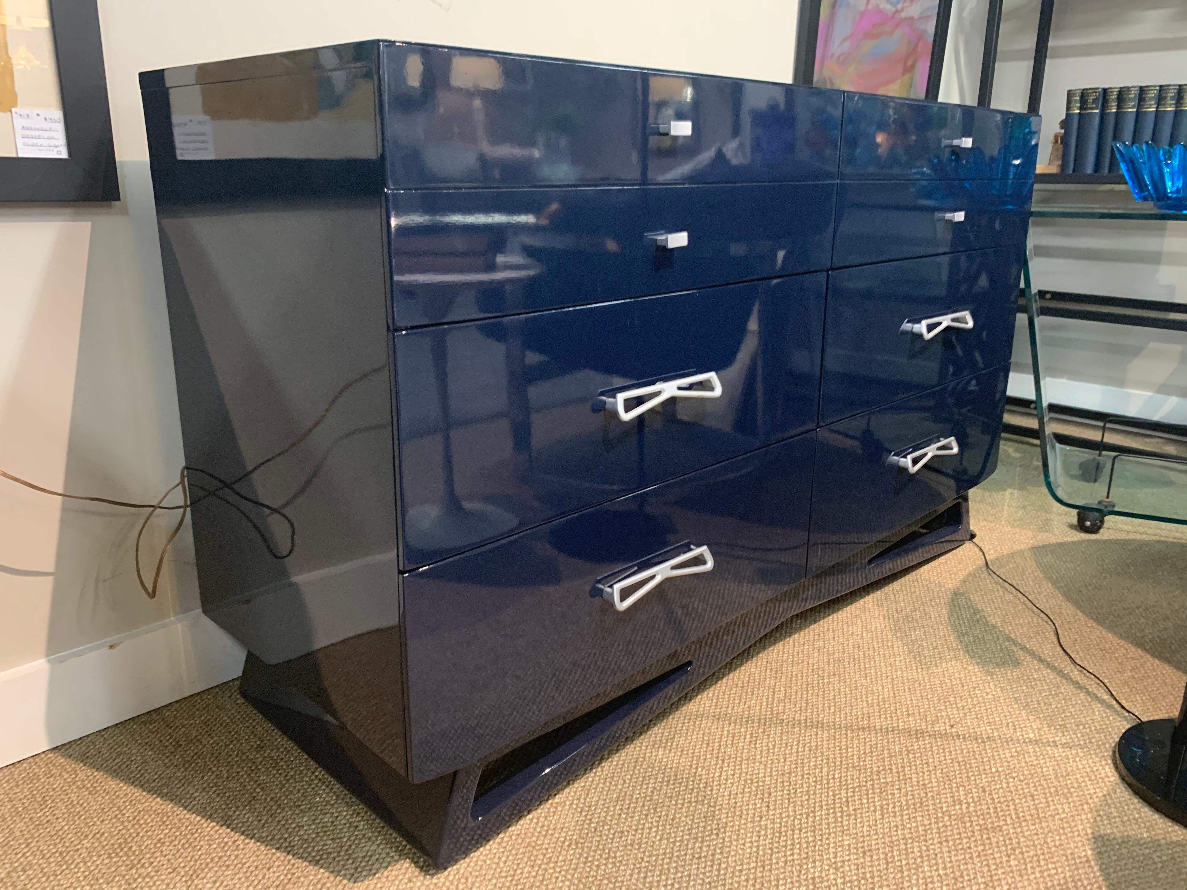 Recently lacquered in a gorgeous navy blue. All original hardware which is space age at its best. Floating base is a showstopper!