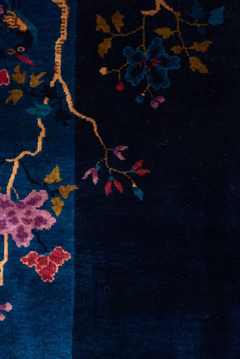 Navy Open Field Antique Chinese Rug with Contrasting Light Colors In Good Condition For Sale In New York, NY