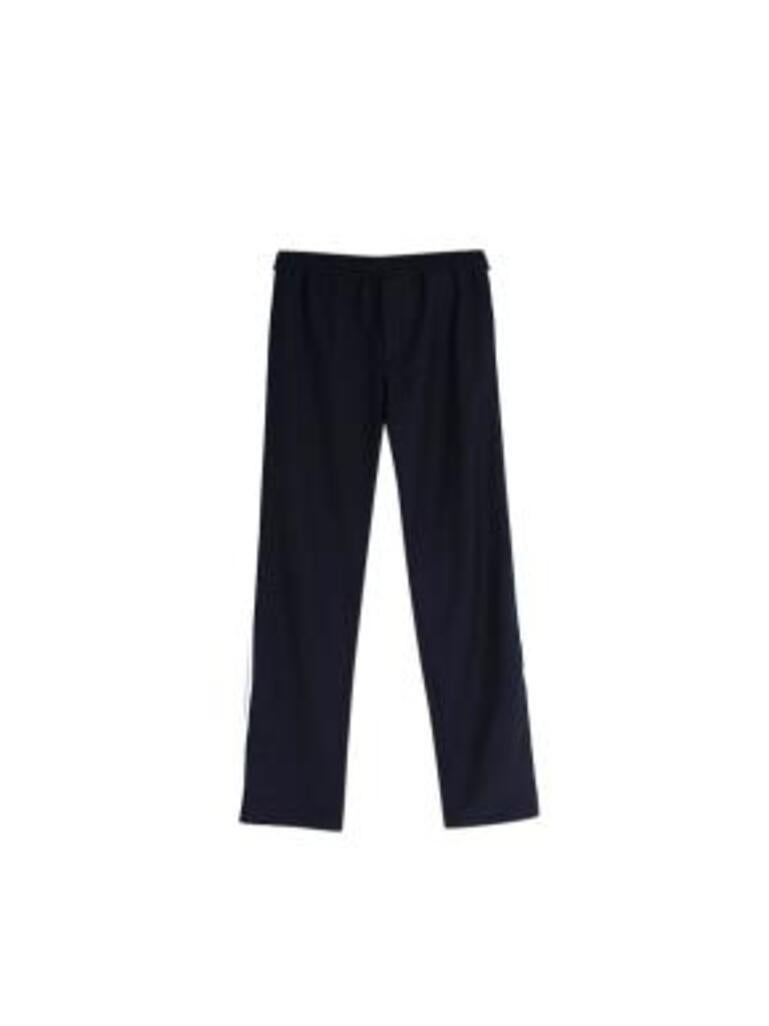 Valentino navy pull-on side stripe trousers
 

 - Relaxed style pull-on trousers in a dark navy wool blend with contrasting side stripe 
 - 2 side pockets and 2 sewn-up back pockets 
 - Elasticated waist with faux fly detail
 - Straight leg with