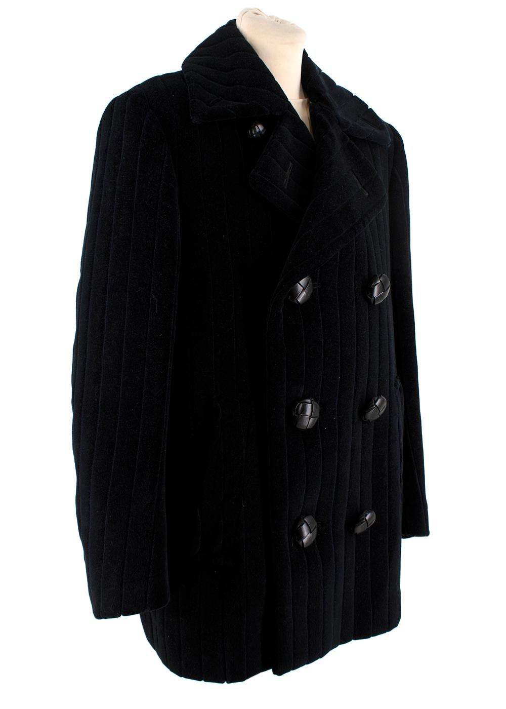 Raf Simons Navy Quilted Velvet Pea Coat

- Long sleeve quilted cotton velvet coat 
- Notched lapel collar and double-breasted button closure at front
- Welt pockets at waist
- Black leather buttons 
- Boxy cut, with a structured shoulder
- Fully