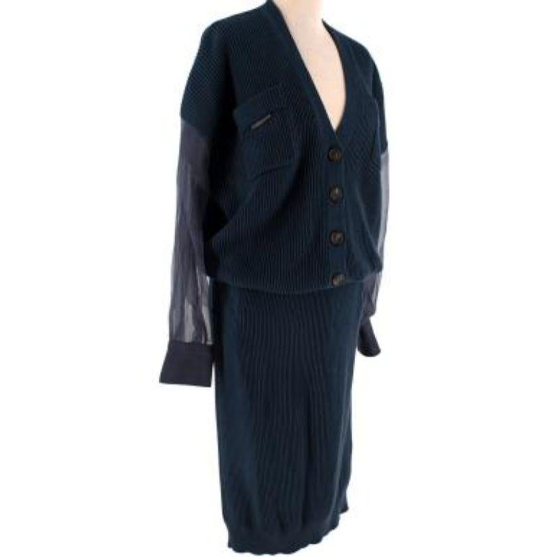 Brunello Cucinelli navy ribbed knit sheer sleeve cardigan & skirt 
 

 - Deep navy ribbed knit cardigan with v-neck, and sheer chiffon sleeves
 - Co-ordinating, pull-on tube skirt with drawstring waistband 
 

 Materials:
 100% Cotton 
 

 Made in