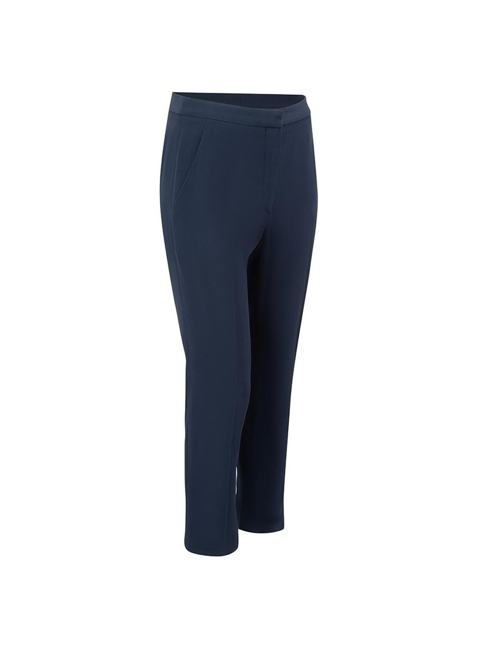 CONDITION is Very good. Minimal wear to trousers is evident. Minimal wear to rear-left and rear lining with light marks on this used Alexander McQueen designer resale item.



Details


Navy 

Synthetics

Slim leg trousers

High waisted

Fly zip