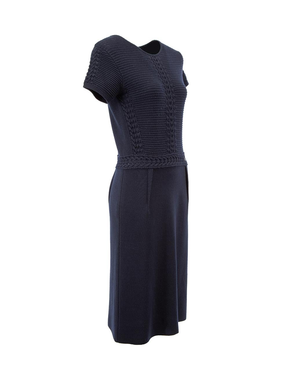 CONDITION is Good. Minor wear to dress is evident. Light wear to the left side with a small hole and neckline lining on this used CH Carolina Herrera designer resale item.



Details


Navy

Wool

Knitted dress

Round neck

Short sleeves

Cable knit