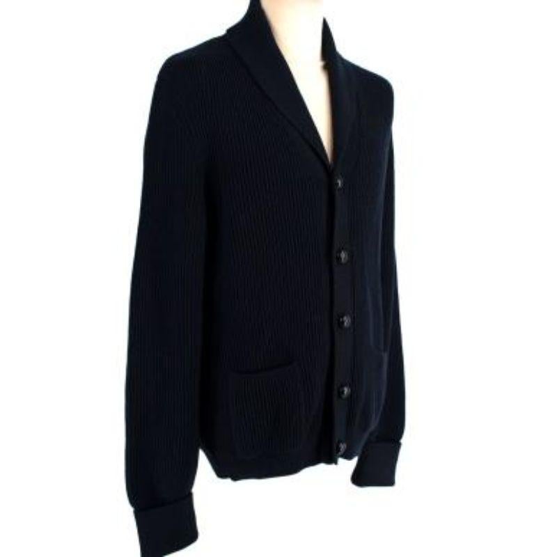 Tom Ford Navy Wool Shawl Collar Cardigan
 
 
 
 -Ribbed knit
 
 -Shawl lapels
 
 -Button fastening
 
 -Long sleeves
 
 -Two front patch pockets
 
 -Heavy weight construction 
 
 
 
 Material: 
 
 
 
 100% Wool 
 
 
 
 Made in Italy 
 
 
 
 PLEASE
