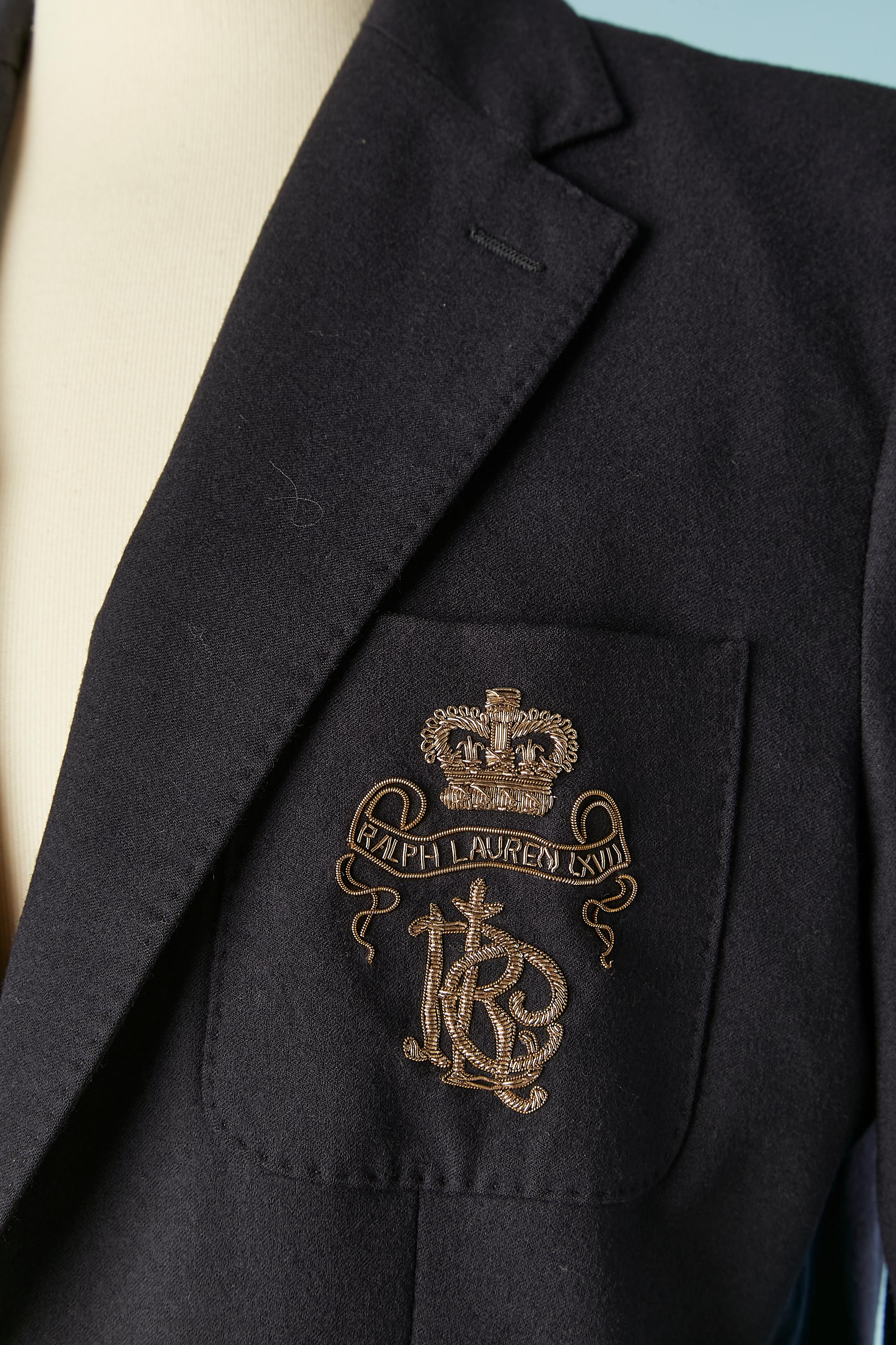 Navy wool single breasted blazer with gold embroideries on pocket. Thin shoulder-pads. Rayon lining. 
SIZE 8 (Us) M 