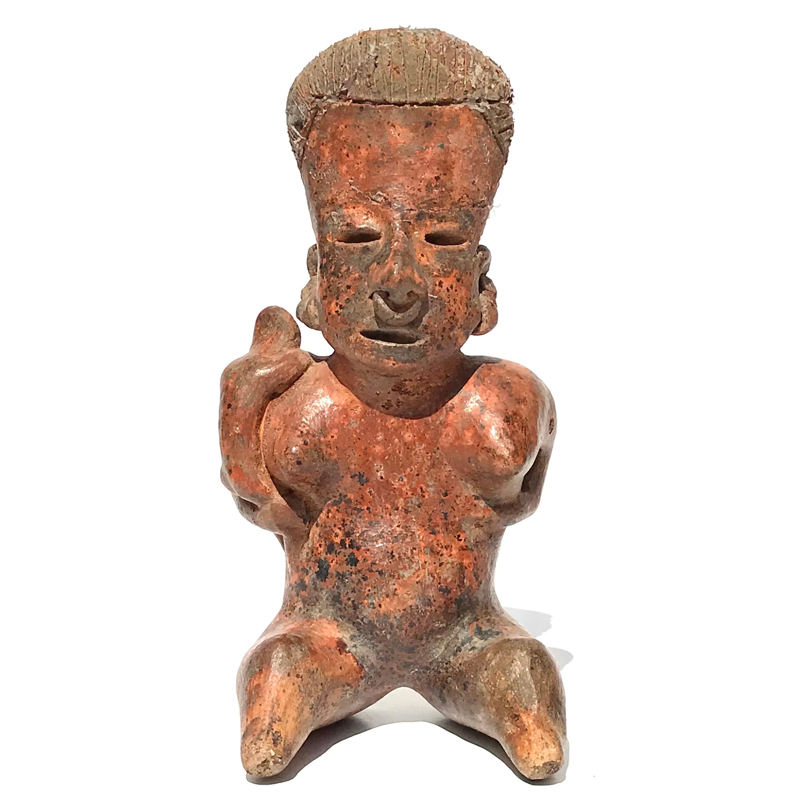 Vernissé Poterie de Nayarit Figure féminine de fertilité avec enfant en vente
