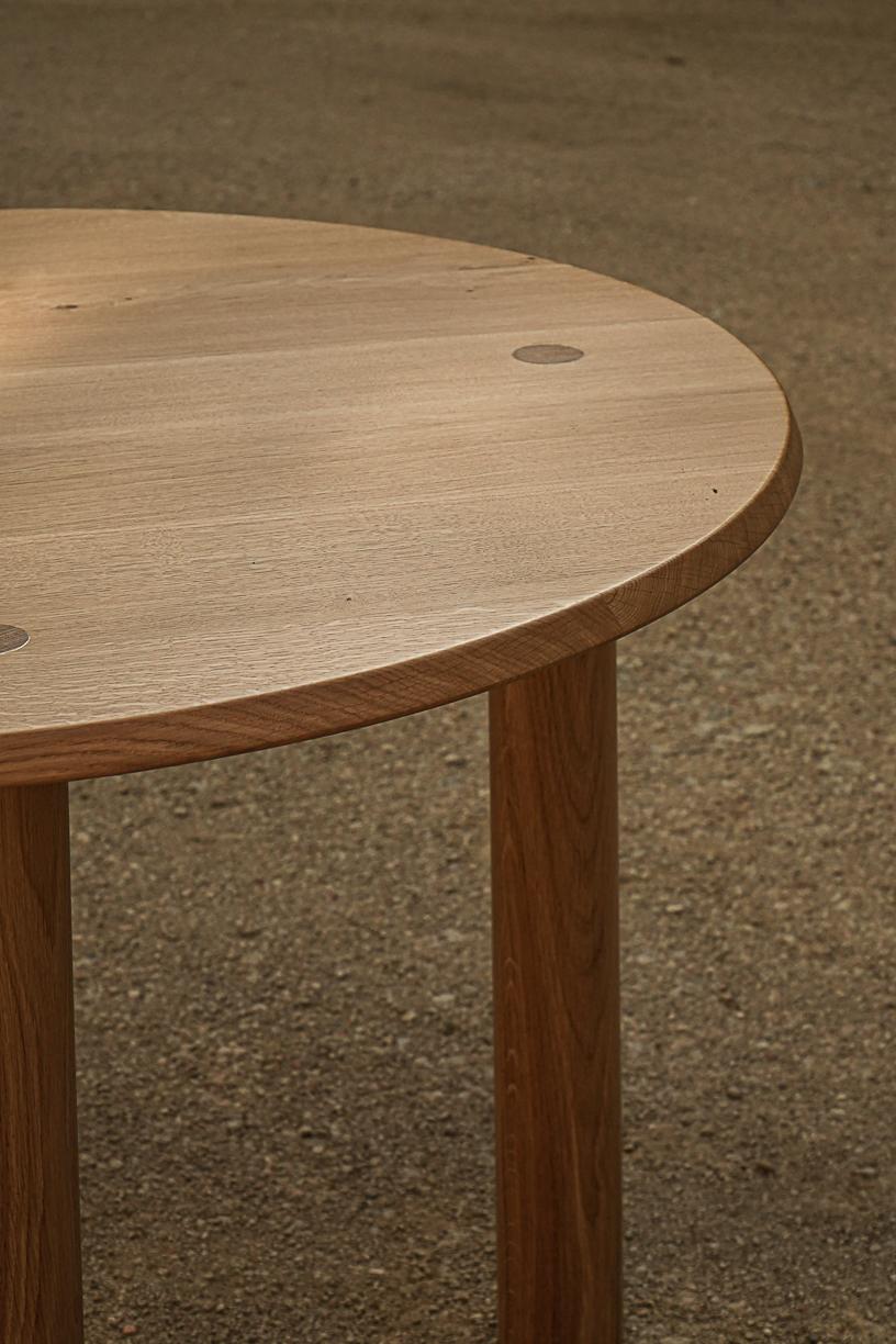 Varnished Nayati Round Dining Table by La Lune For Sale