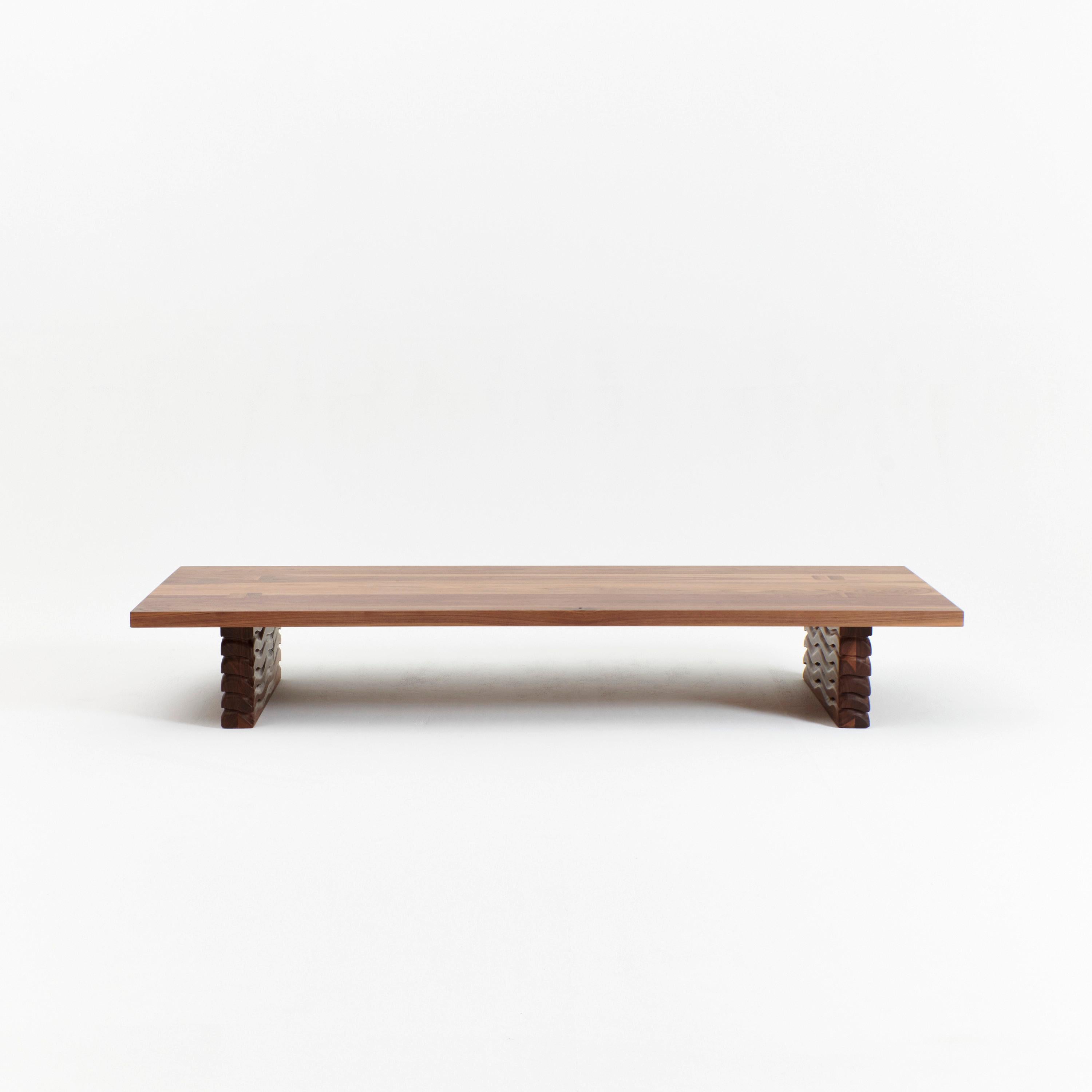 NAZARÉ COFFE TABLE, designed in 2024.

The Nazaré coffee table is crafted from solid walnut with hand-carved legs featuring a detailed wave texture giving the piece it's name.

Bespoke dimensions available upon request. Please inquire to view other