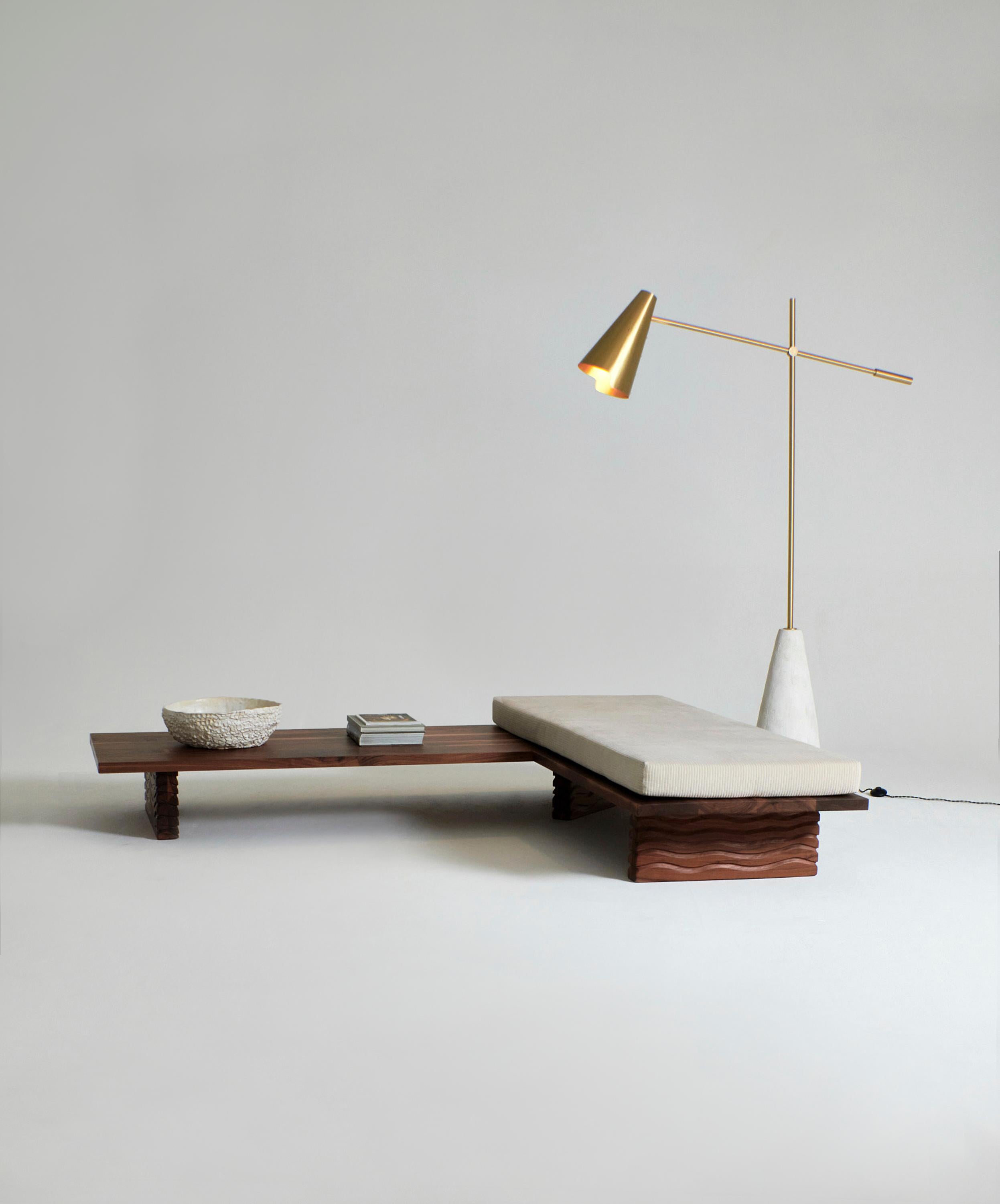 NAZARÉ DAYBED - L shape, designed in 2024.

The Nazaré Daybed is crafted from solid walnut and has two removable cushions. The legs have a hand-carved detailed wave texture giving the piece it's name.

Available in customer’s own material. Please