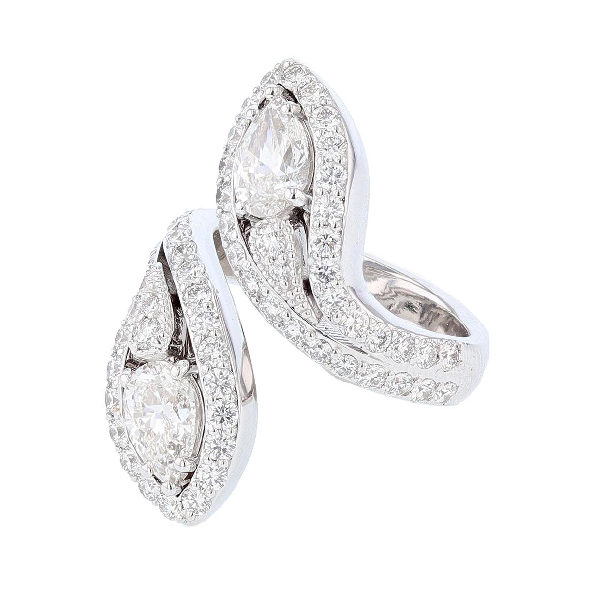 This ring is designed by Nazarelle and made in 14k white gold. This ring features a pear shaped diamond, prong set, GIA Certified weighing 1.00cts with a color grade (G) and clarity (VS2). The GIA report number is 16244857. The second pear shaped