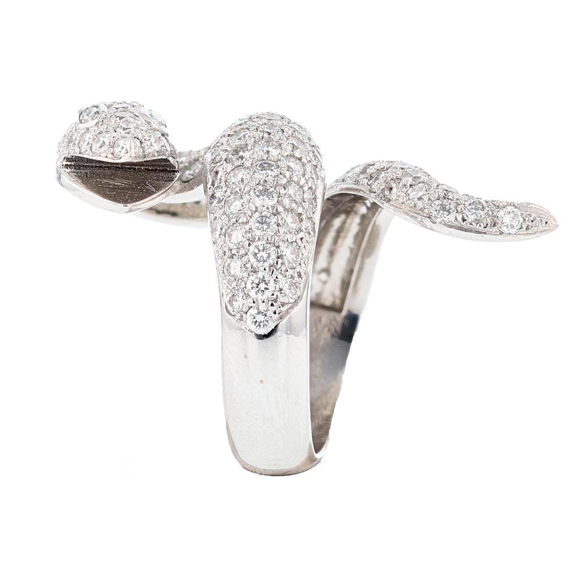 This ring is designed by Nazarelle and made in 18K white gold. The ring features 42 round cut white diamonds weighing 3.29ct prong set and 2 marquise cut diamonds weighing .10 that are bezel set with color grade (H) and  clarity grade (SI2).