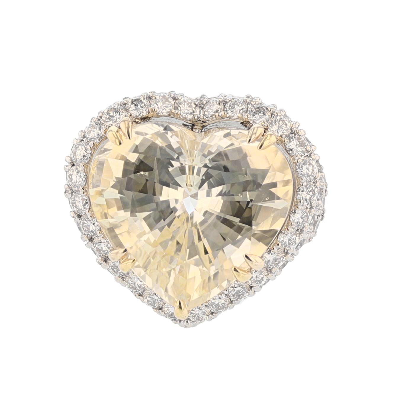 This ring is made in 14K white and yellow gold featuring a heart shape, No Heat, GIA certified, Ceylon yellow sapphire weighing 20.49 CT. The certificate number is 