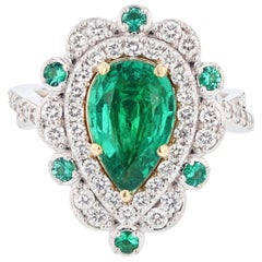 Nazarelle 18 Karat Gold Pear Shape Green Emerald and Diamond Ring