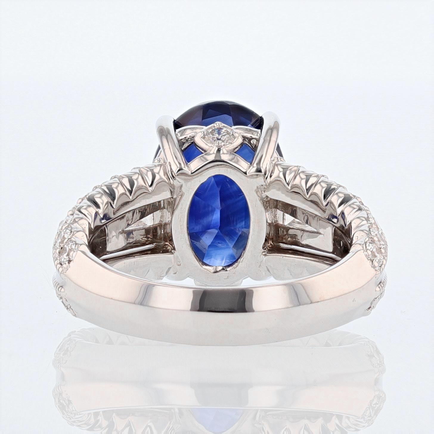 Oval Cut Nazarelle 18 Karat Gold 7.28 Carat Certified Blue Sapphire and Diamond Ring For Sale