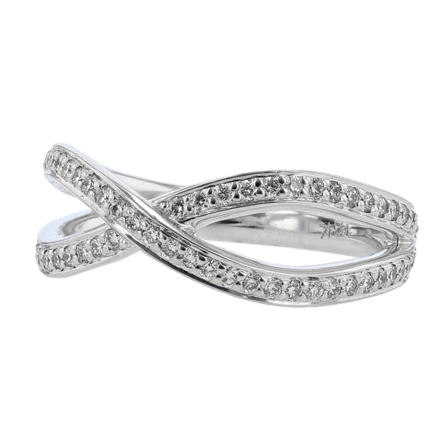 This ring is designed by Nazarelle. The ring is made in 18k white gold and features round cut diamonds weighing 0.50ct.