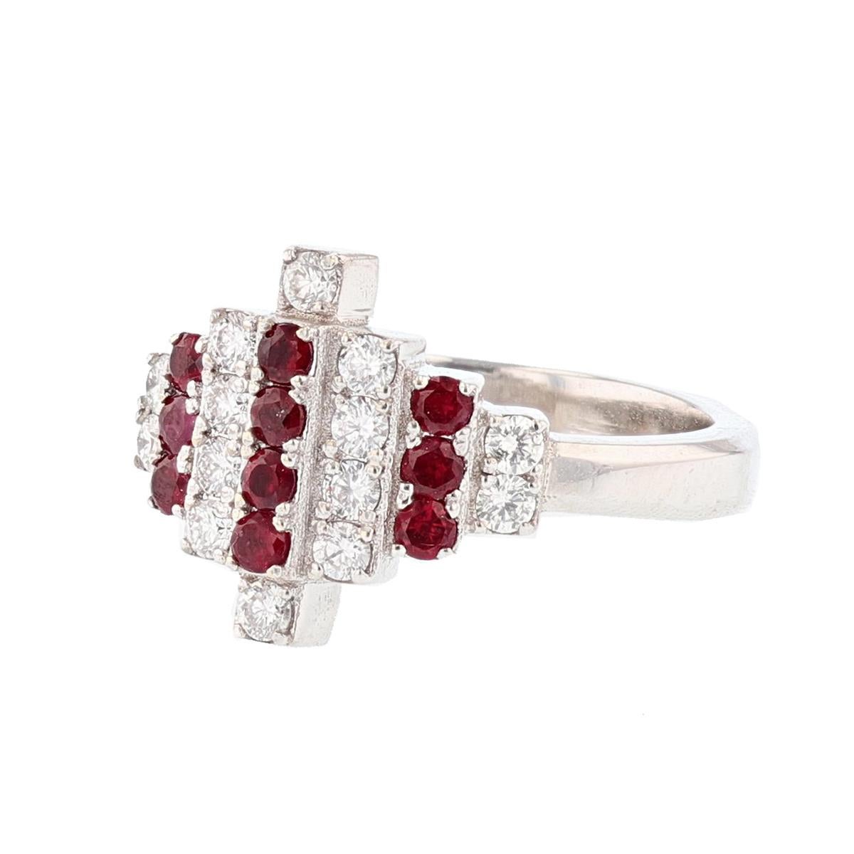 This ring is made in 18k white gold and features 10 round cut, prong set rubies weighing 0.35ct and 14 round cut, prong set diamonds weighing 0.38ct with a color grade (G) and clarity grade (SI1). 