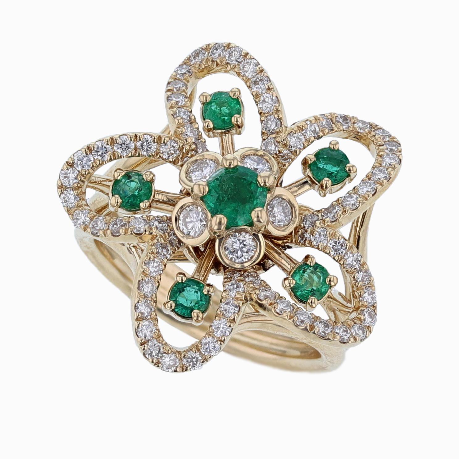 This ring is designed by Nazarelle and made in 18K yellow gold. The ring features 6 round shape emeralds weighing 0.65ct prong set and 71 round cut diamonds weighing 0.89ct pave and bezel set color grade (G) clarity grade (VS2) 