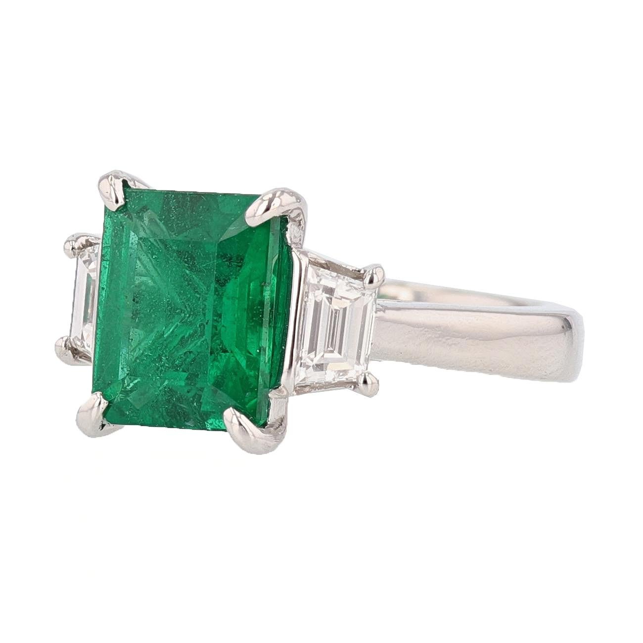 This ring is designed by Nazarelle and made in Platinum and features a 3.10ct Emerald Cut Natural Beryl Emerald (Treated) with a GIA certificate.  The GIA certificate number is 