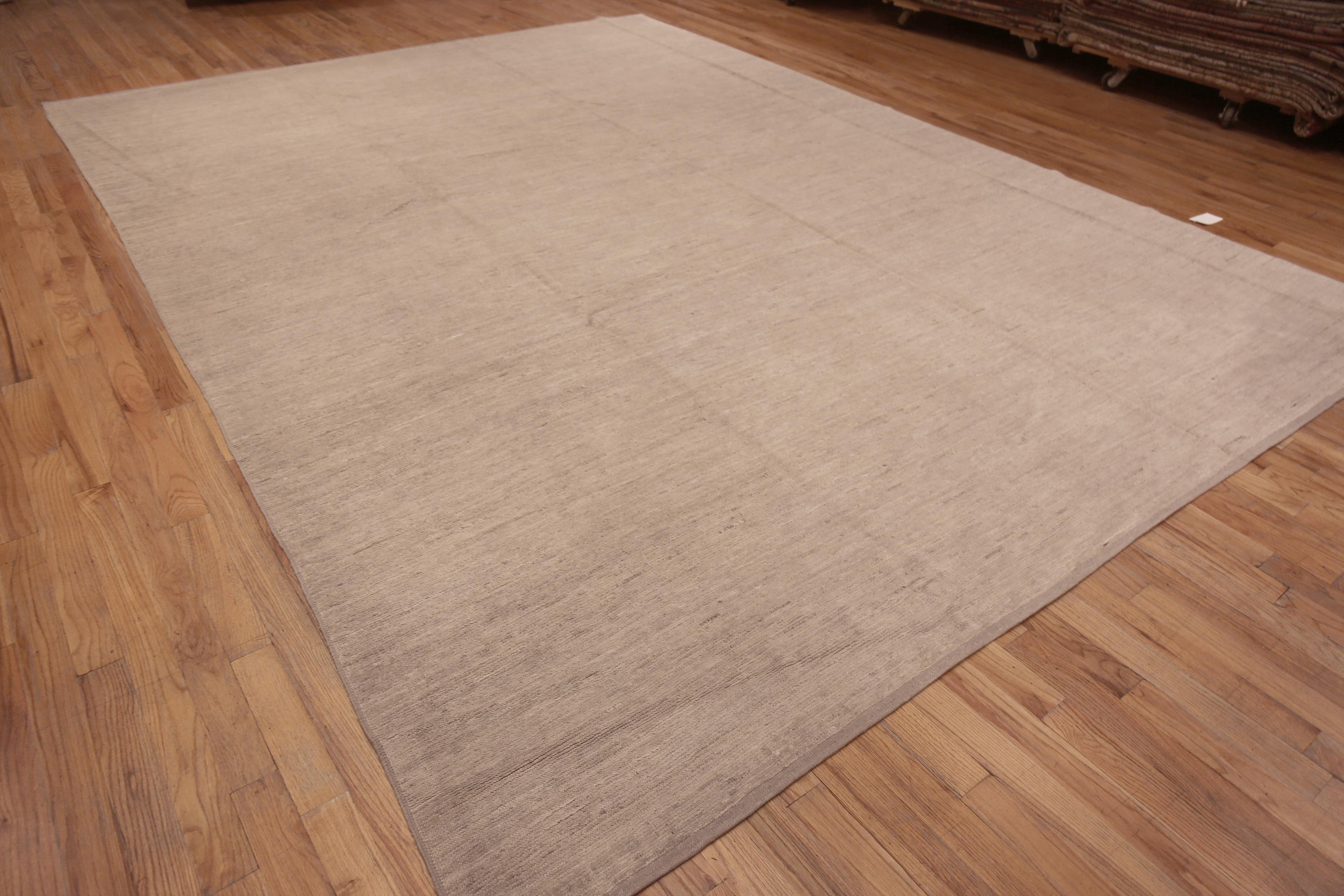Beautifully Decorative Abstract Solid Minimalist Cream Color Modern Room Size Area Rug, Country Of Origin: Central Asia, Circa Date: Modern Rug