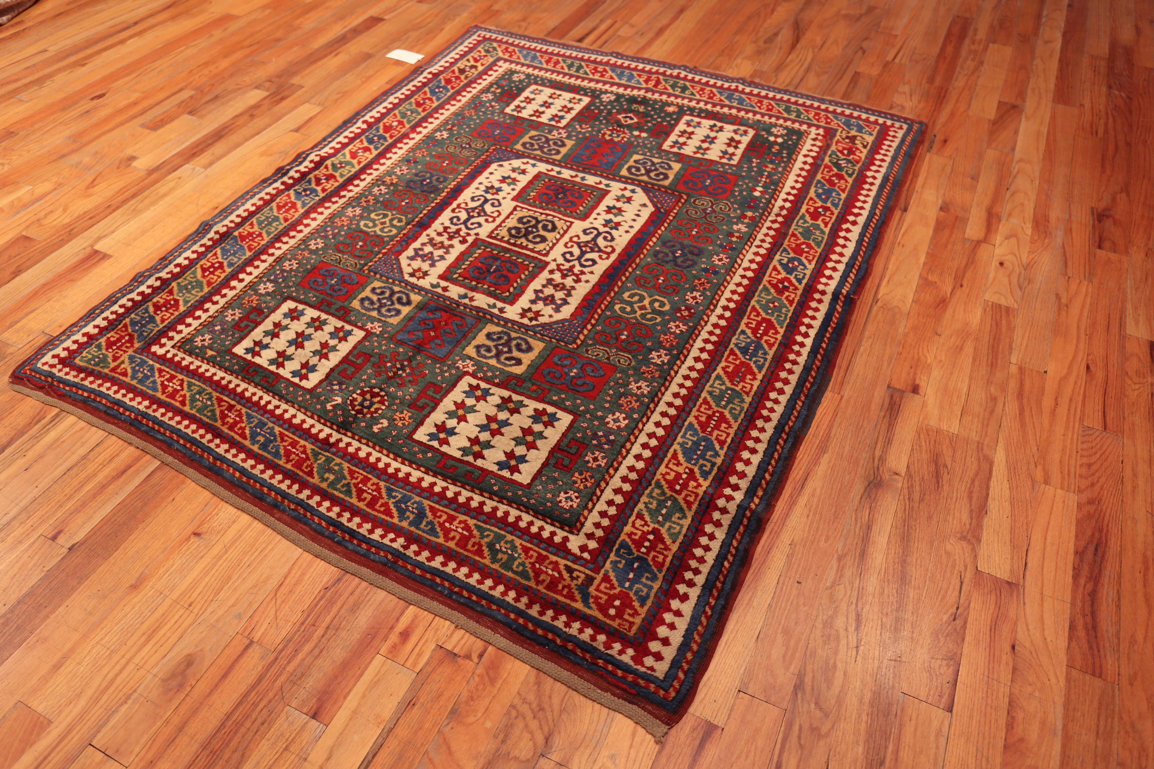 Antique Caucasian Karachopf Kazak Rug with Bold Geometric Motifs and Rich Tribal Colors, Origin: Caucasus, Circa Date: 1880

