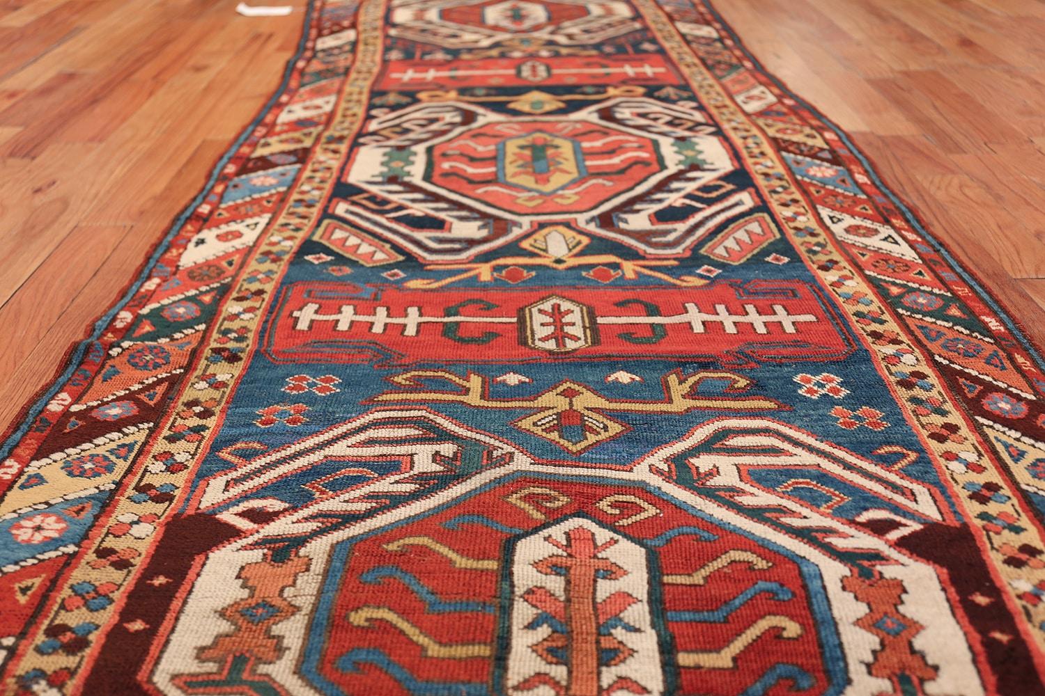 Beautiful Tribal design antique Caucasian Lankoran runner rug, country of origin / rug type: Caucasian rugs, circa 1900. Size: 3 ft 5 in x 11 ft (1.04 m x 3.35 m)

This bold, antique Caucasian rug is filled in with bright red, black, yellow and