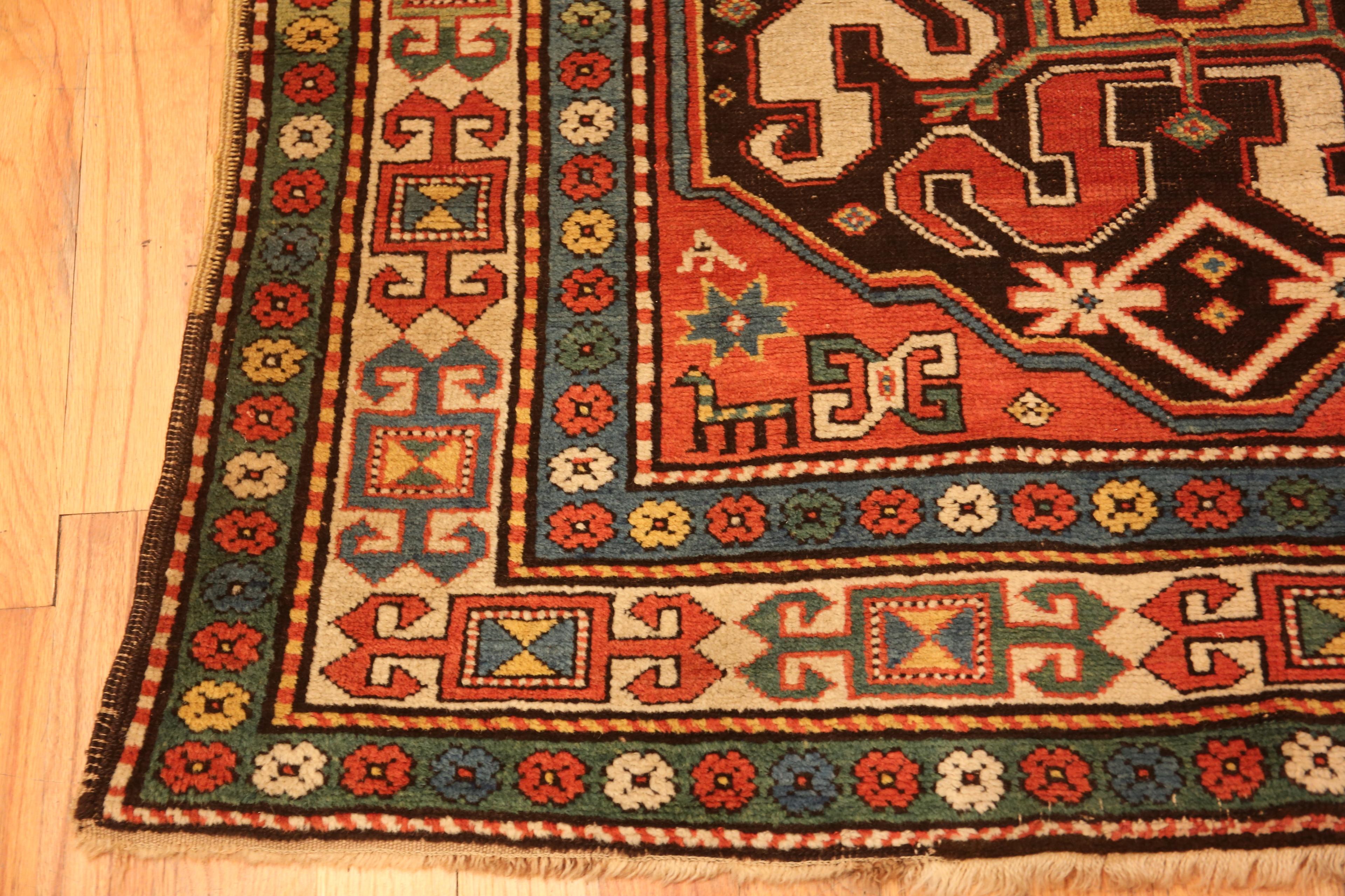 20th Century Antique Caucasian Tribal Kazak Rug. 4 ft 4 in x 6 ft 6 in For Sale