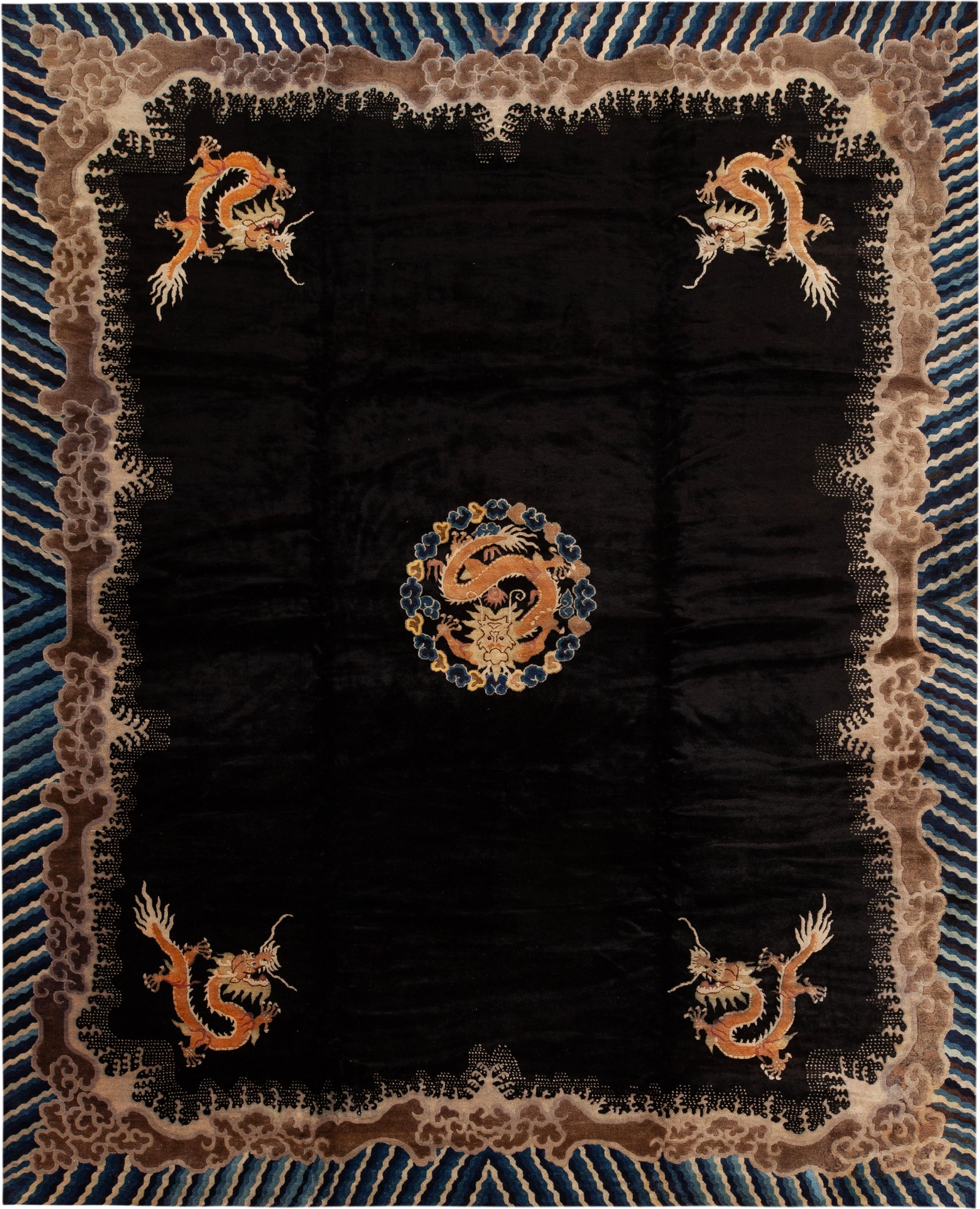 Antique Chinese Black and Gold Peking Dragon Motif Rug, County of Origin: China, Circa Date: 1920