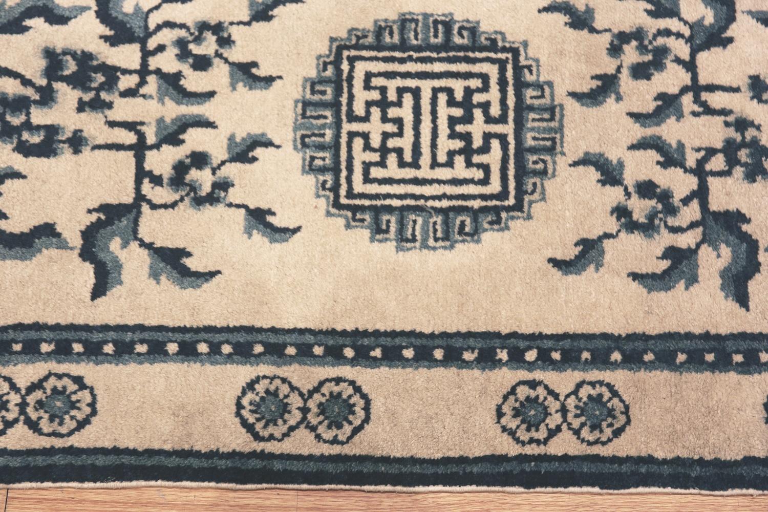 Gorgeous Ivory Background Antique Chinese Rug, Country of Origin: China, Circa Date: 1900 – This gorgeous antique Chinese rug from 1900 will make an excellent addition to an Asian themed or Chinoiserie style room. It has an earthy feel and pays