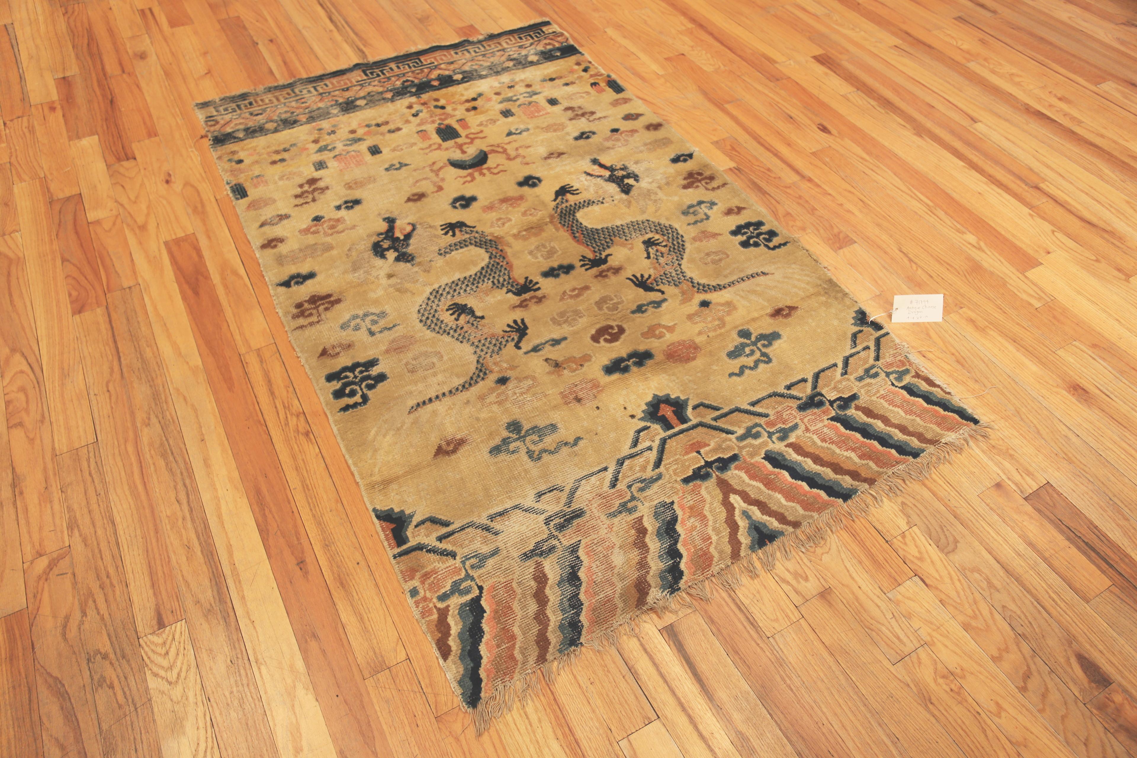 Antique Cloud Band Dragon Design Chinese Pillar Rug, Country of Origin: China, Circa date: 1900. Size: 4 ft 4 in x 6 ft 10 in (1.32 m x 2.08 m)