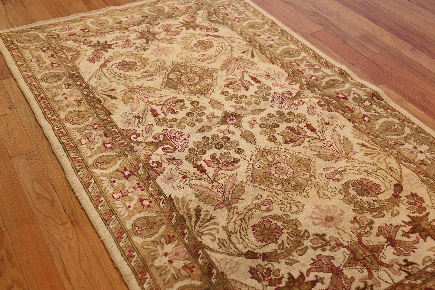 Antique Indian Agra Rug, Origin: India, Circa: Late 19th Century. Size: 4 ft x 6 ft 9 in (1.22 m x 2.06 m)

Lavishly styled, this exquisite antique Indian rug from Agra depicts a magnificent curvilinear arabesque that is rendered in a soft