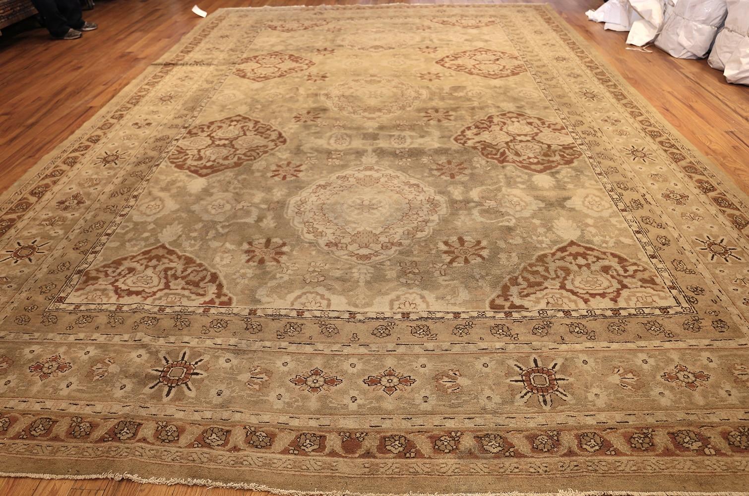 Antique Amritsar rug, origin India, circa 1900. Size: 11 ft 2 in x 16 ft 7 in (3.4 m x 5.05 m)

Indian Amritsar rugs are considered to be some of the finest quality in all of the world. They are based on traditional Persian designs that were brought