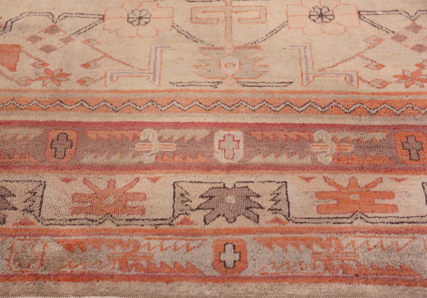 Wool Antique Khotan Rug. Size: 6 ft 11 in x 9 ft 8 in  For Sale