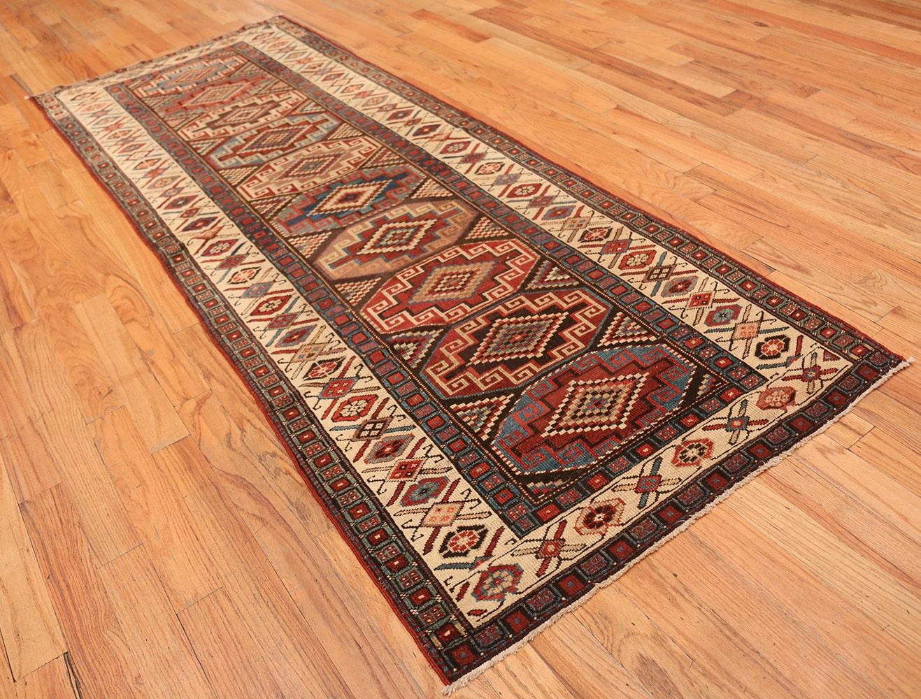 Antique Northwest Persian rug, origin: Persia, circa turn of the 20th century. Size: 3 ft 5 in x 9 ft 3 in (1.04 m x 2.82 m)

Here is a truly beautiful antique oriental rug - an antique Northwest Persian rug that was woven in Persia circa the turn