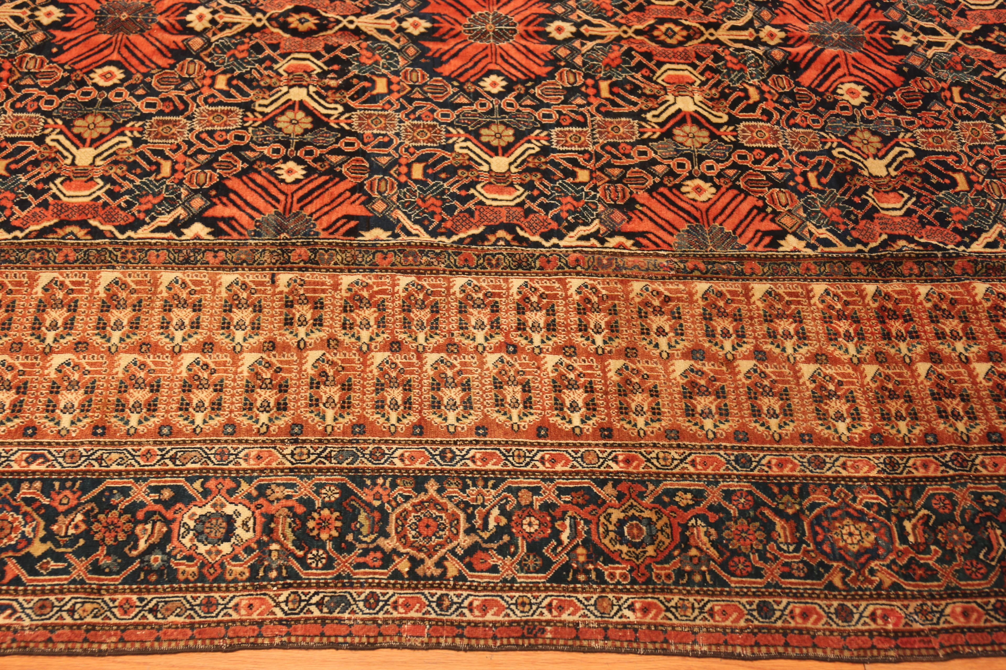 Antique Persian Farahan Gallery Rug, Country of Origin: Persian rug, Circa date: 1900. Size:7 ft 6 in x 15 ft 8 in (2.29 m x 4.78 m)