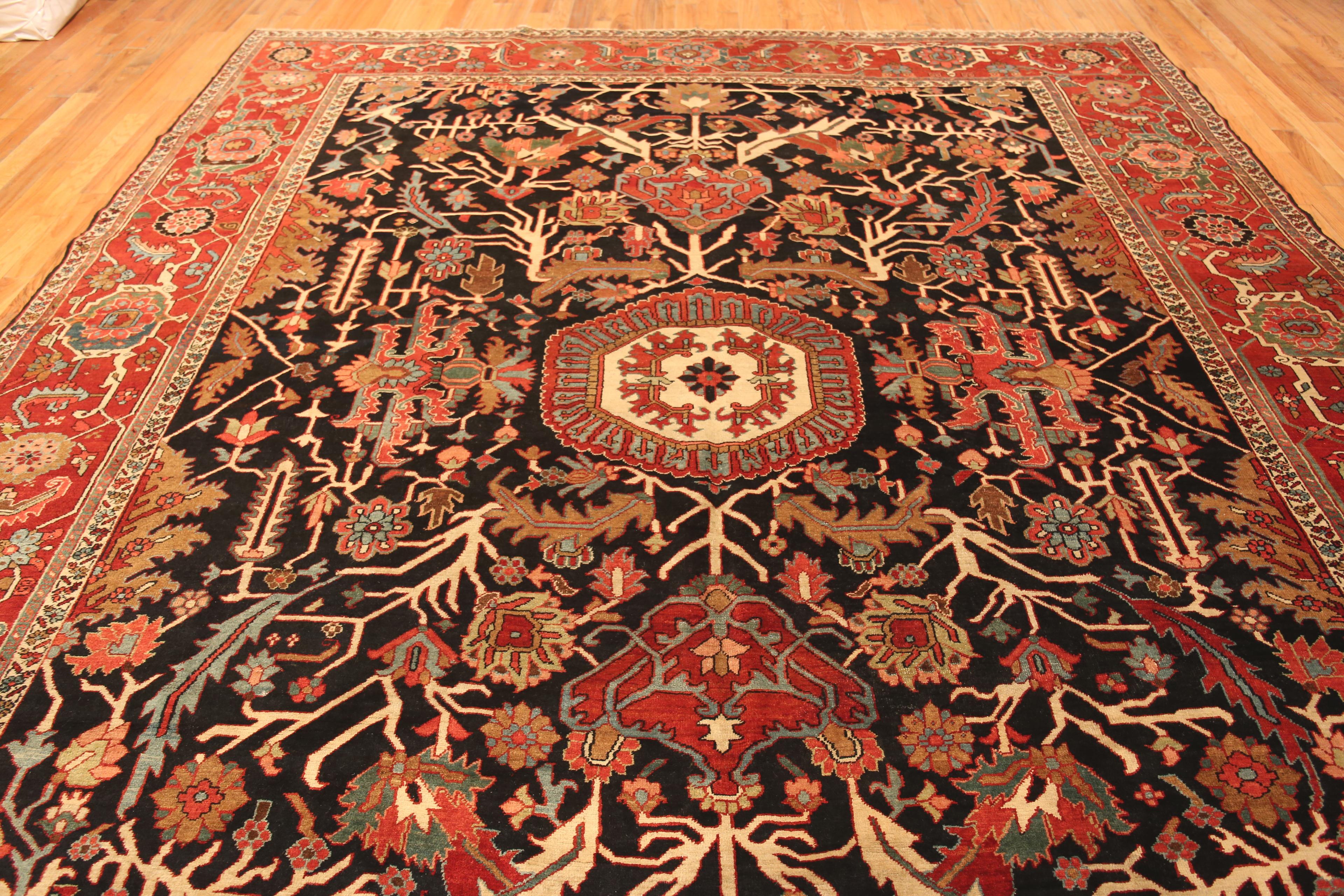 Bold Tribal Antique Room Size Blue Persian Heriz Serapi Rug, Country of Origin: Persia, Circa date: 1920. Size: 11 ft 6 in x 13 ft 2 in (3.51 m x 4.01 m)