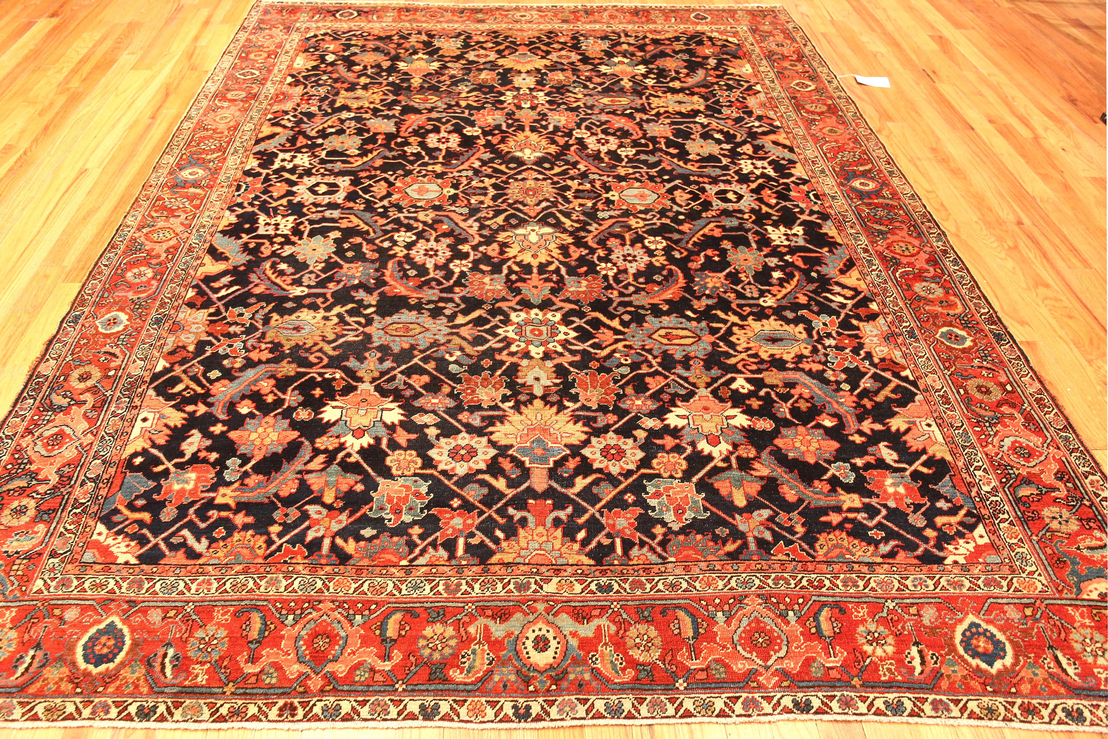 Tribal Geometric Herati Antique Jewel Tone Persian Heriz Allover Area Rug, Country of Origin: Persia, Circa date: 1920. Size: 8 ft 5 in x 10 ft 3 in (2.57 m x 3.12 m)

