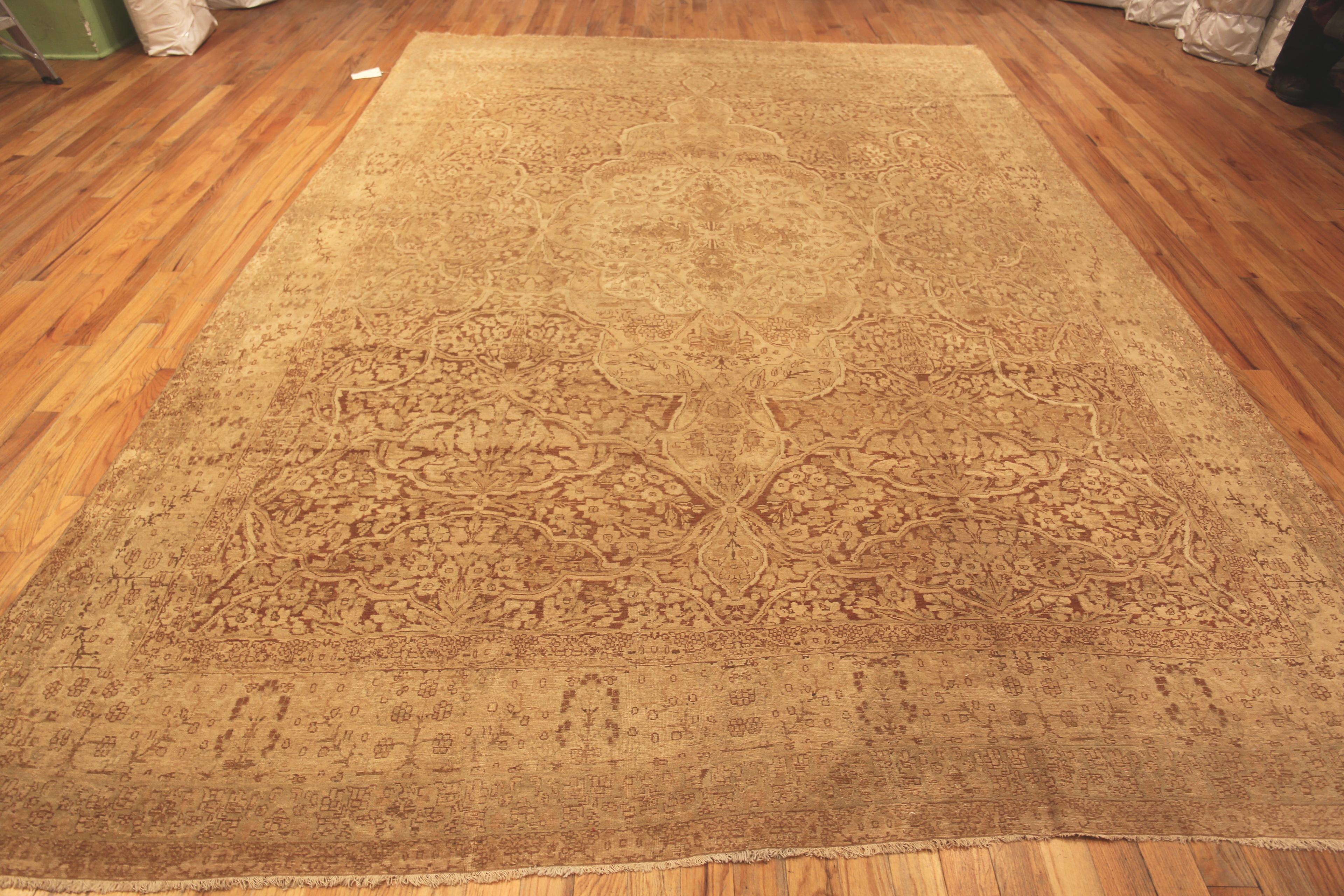 Beautiful Fine Neutral Earthy Traditional Antique Decorative Persian Kerman Rug, Country of origin: Persia, Circa date: 1910. Size: 9 ft 7 in x 14 ft 2 in (2.92 m x 4.32 m).