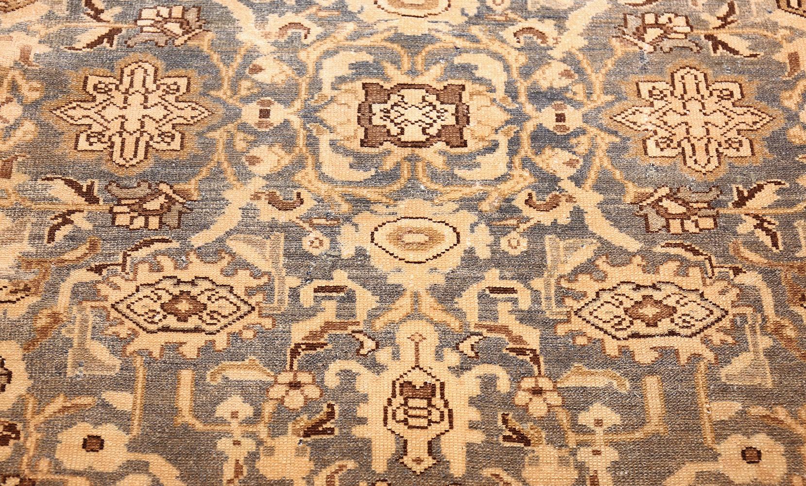 Antique Malayer rug, Persia, circa first quarter of the 20th century. Size: 10 ft 5 in x 13 ft 8 in (3.17 m x 4.17 m)

Exceeding the humble village designs and dimensions that Malayer rugs are prized for, this antique room-sized Persian carpet