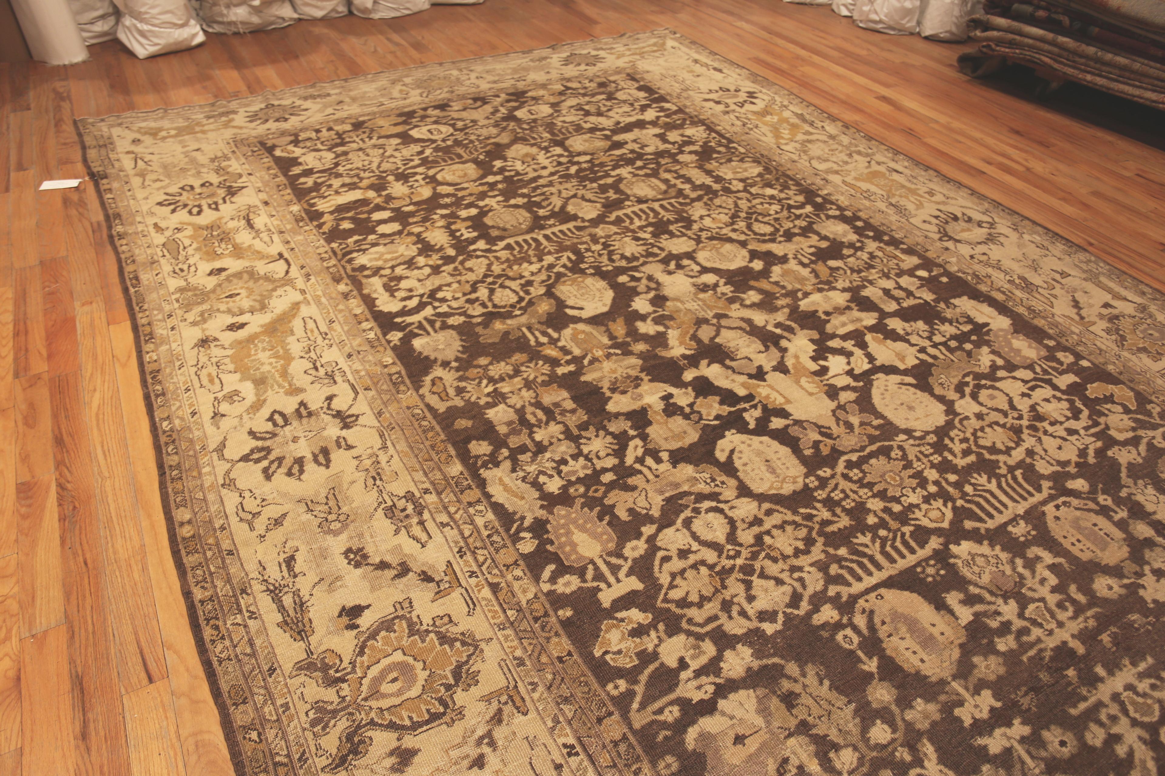 Large Casual Paisley Design Neutral Earthy Antique Rustic Persian Sultanabad Rug, Country of Origin: Persia, Circa Date: 1900. Size: 10 ft 1 in x 16 ft 5 in (3.07 m x 5 m)

