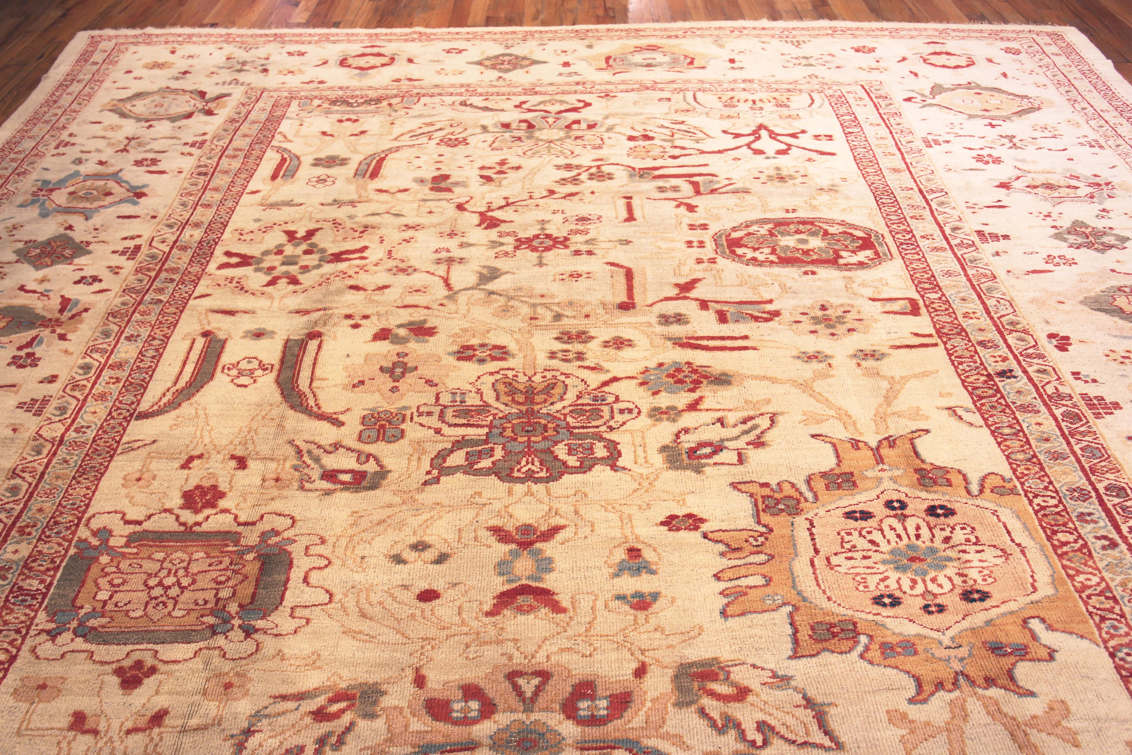 
Impressive Oversized Luxurious Ivory Antique Persian Ziegler Sultanabad Rug, Country of Origin: Persia, Circa date: 1880 – The city of Sultanabad was once known as Arak and is located in what is now Iran. The region has a long history of carpet