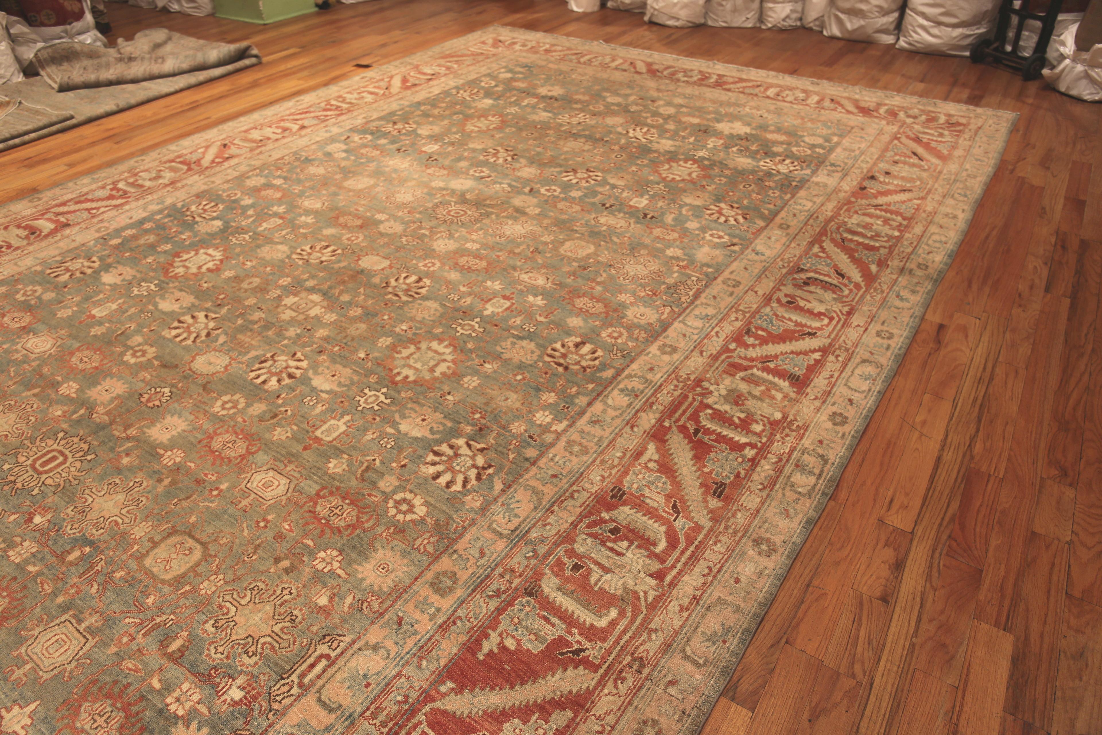 Beautifully Decorative Oversized Rustic Antique Tribal Persian Malayer Rug, Country of Origin: Persia, Circa date: 1920. Size: 11 ft 10 in x 21 ft 9 in (3.61 m x 6.63 m)