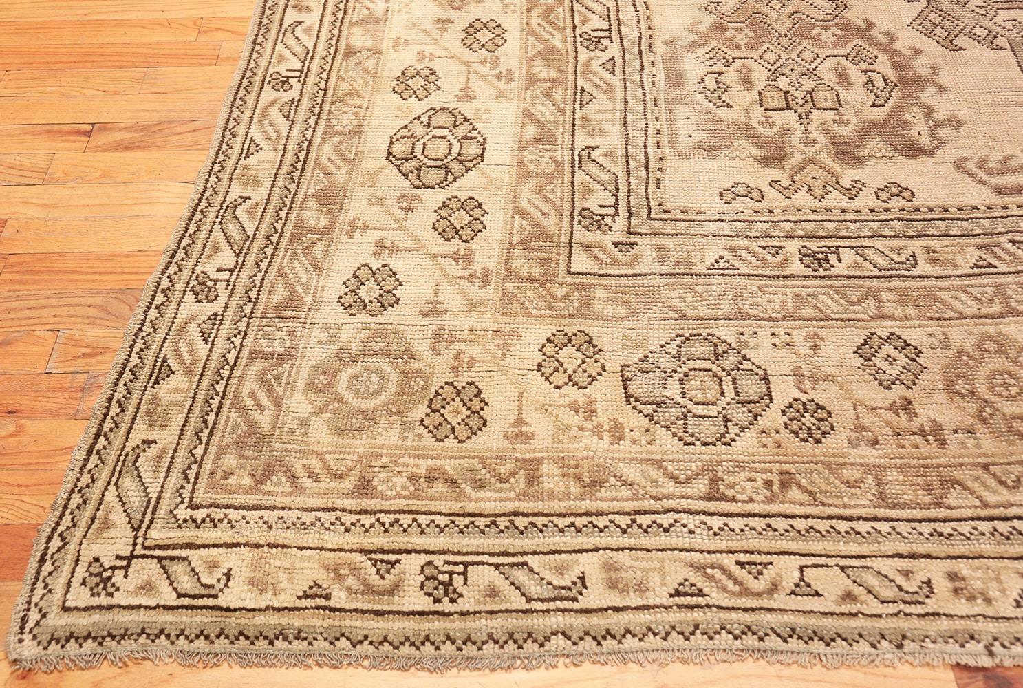 Very large and square antique Turkish Oushak carpet, Country of Origin: Turkey, circa early 20th century – Size: 17 ft 7 in x 18 ft 7 in (5.36 m x 5.66 m)

Impressive in its style and scale, this magnificent antique Oushak rug features a