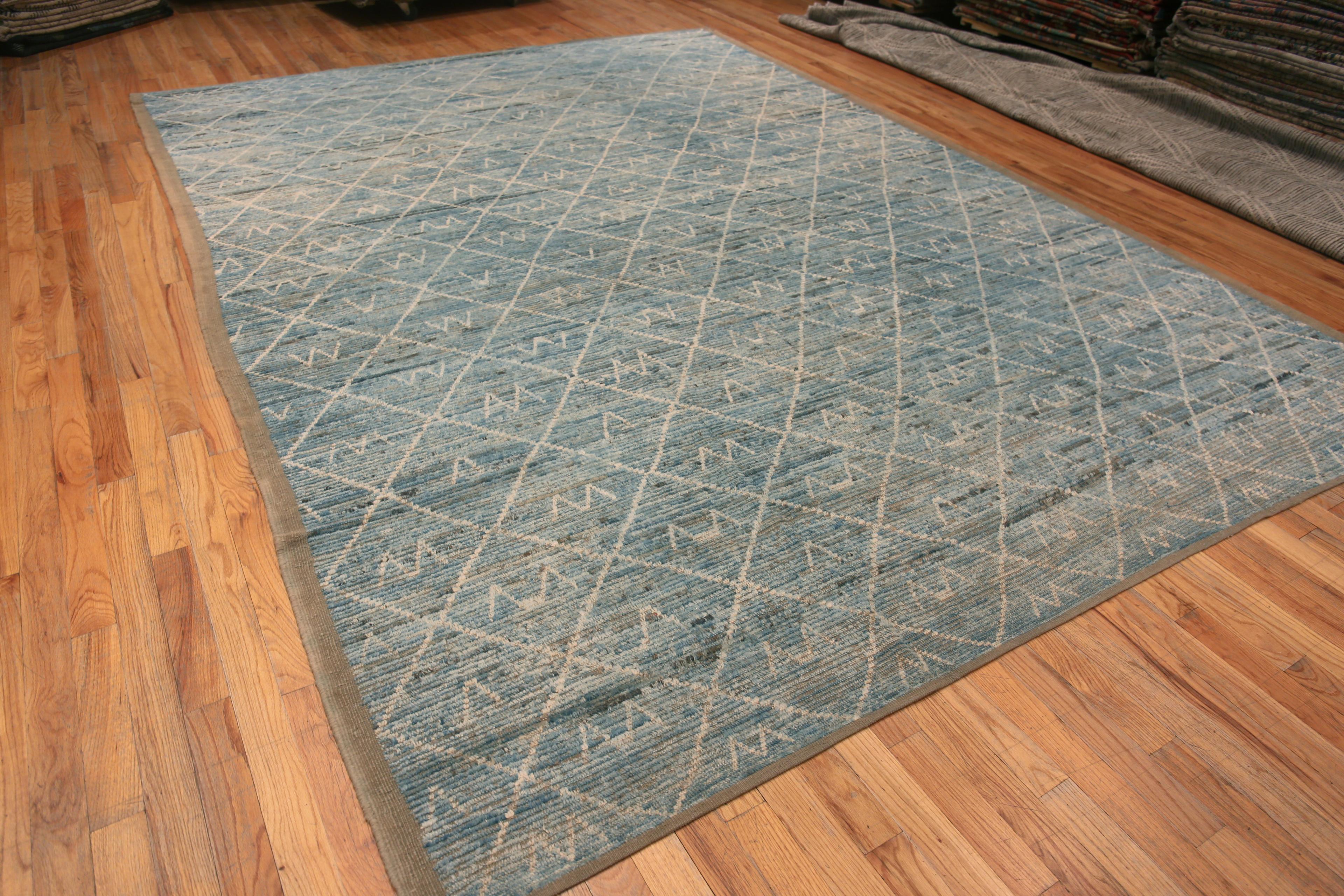 A Beautiful Light Blue Abrash Background Creamy White Color Tribal Pattern Modern Room Size Area Rug, Country of Origin: Central Asia, Circa Date: Modern Rug 