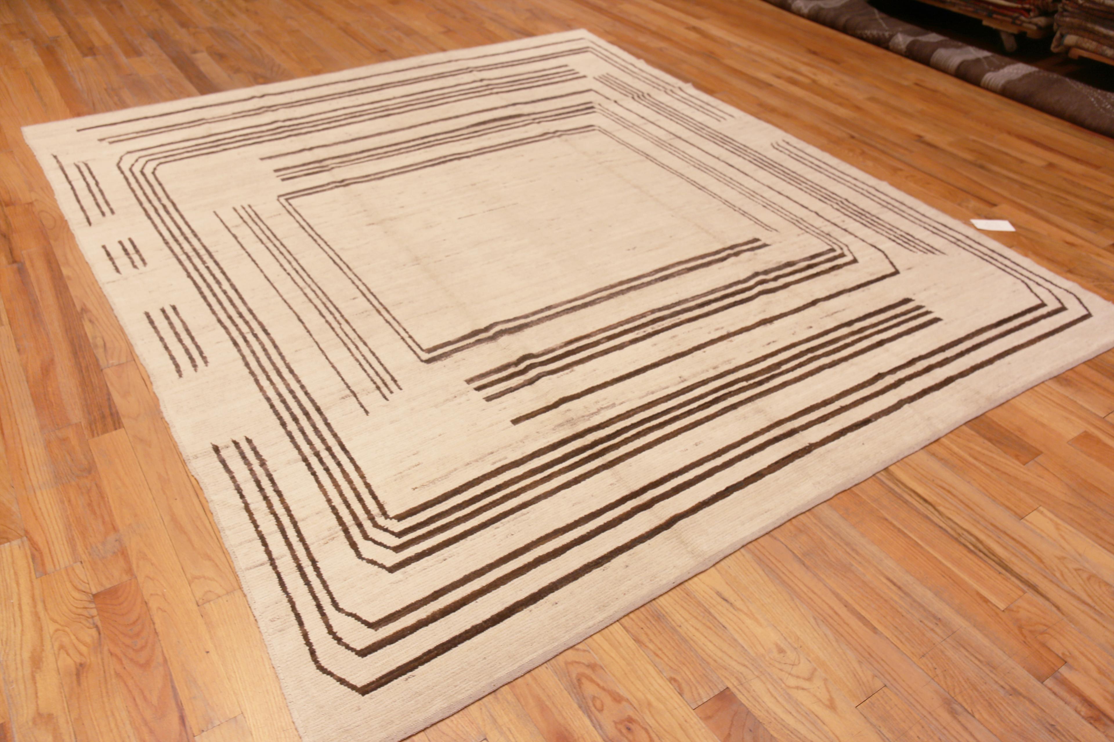 A Decorative and Artistic Ivory Cream Background Brown Geometric Square Design Modern Room Size Area Rug, Country of Origin: Central Asia, Circa Date: Modern Rug 