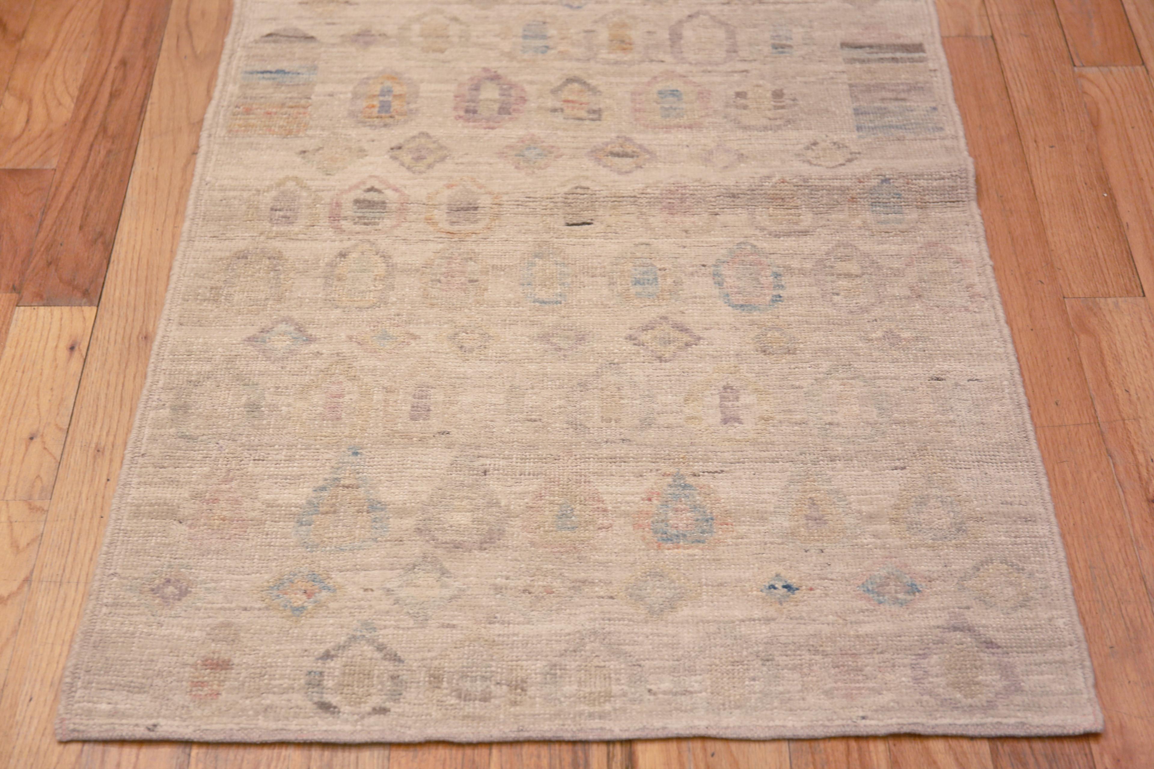 Beautifully Decorative Light Cream Color Soft Washed Out Tribal Geometric Pattern Modern Hallway Runner Rug, Country Of Origin: Central Asia, Circa Date: Modern Rug 