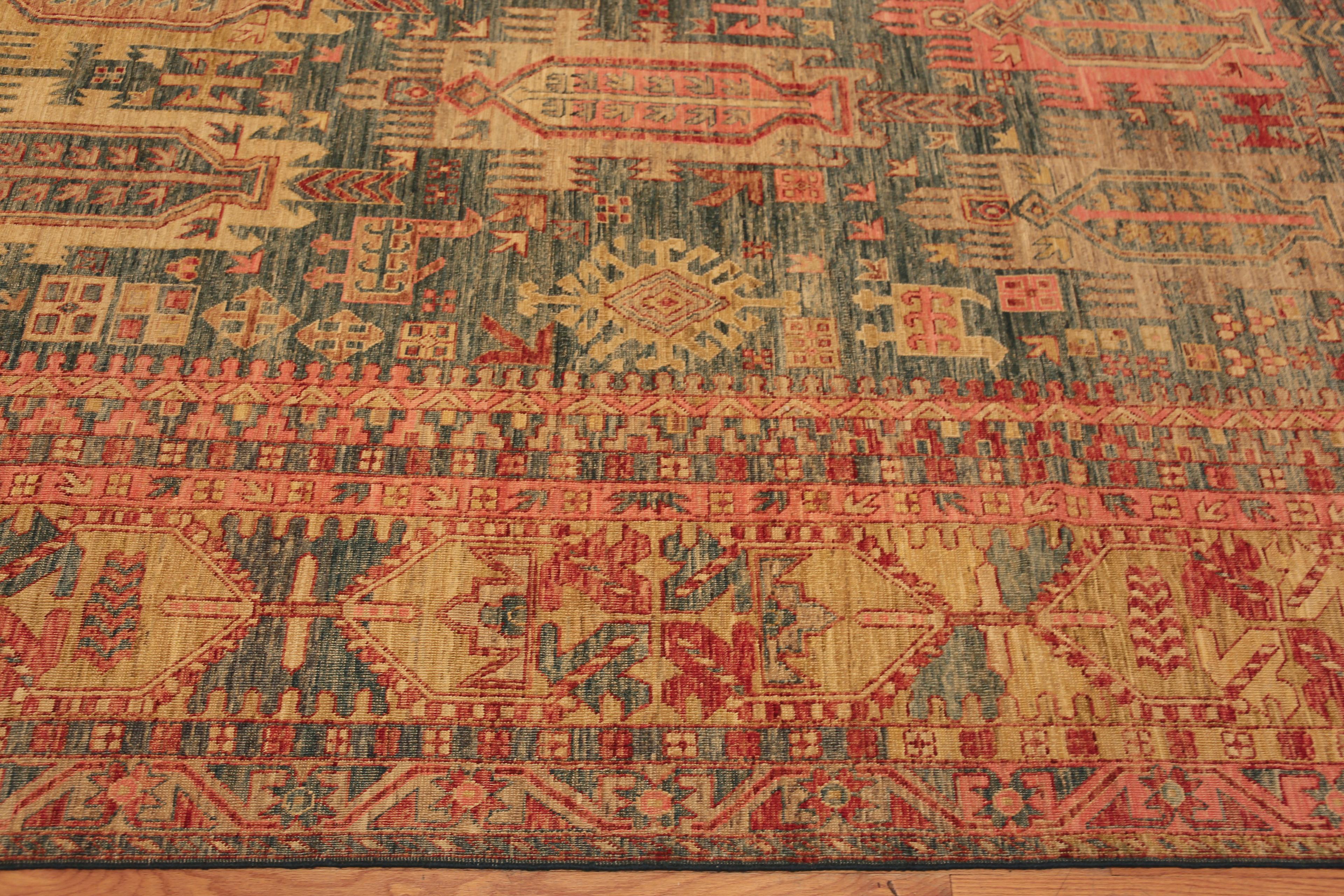 A Beautiful Happy Jewel Tone Color Tribal Geometric Animal Caucasian Design Modern Area Rug, Country of Origin: Central Asia, Circa Date: Modern Rug 