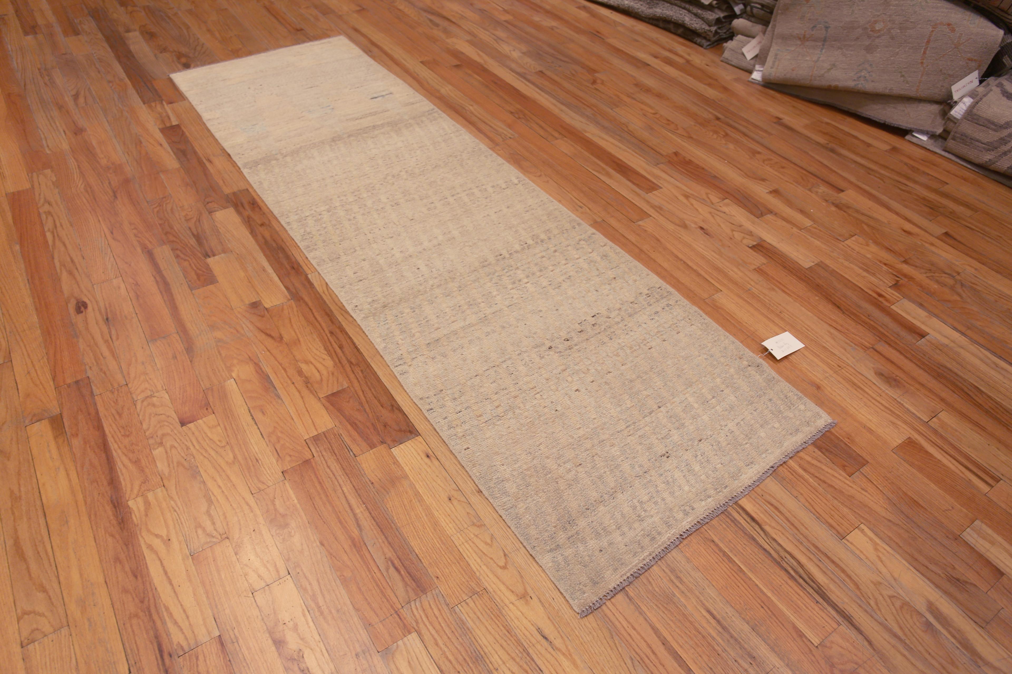 A Beautifully Washed Out And Decorative Light Color Tribal Design Modern Hallway Runner Rug, Country of Origin: Central Asia, Circa Date: Modern Rug 