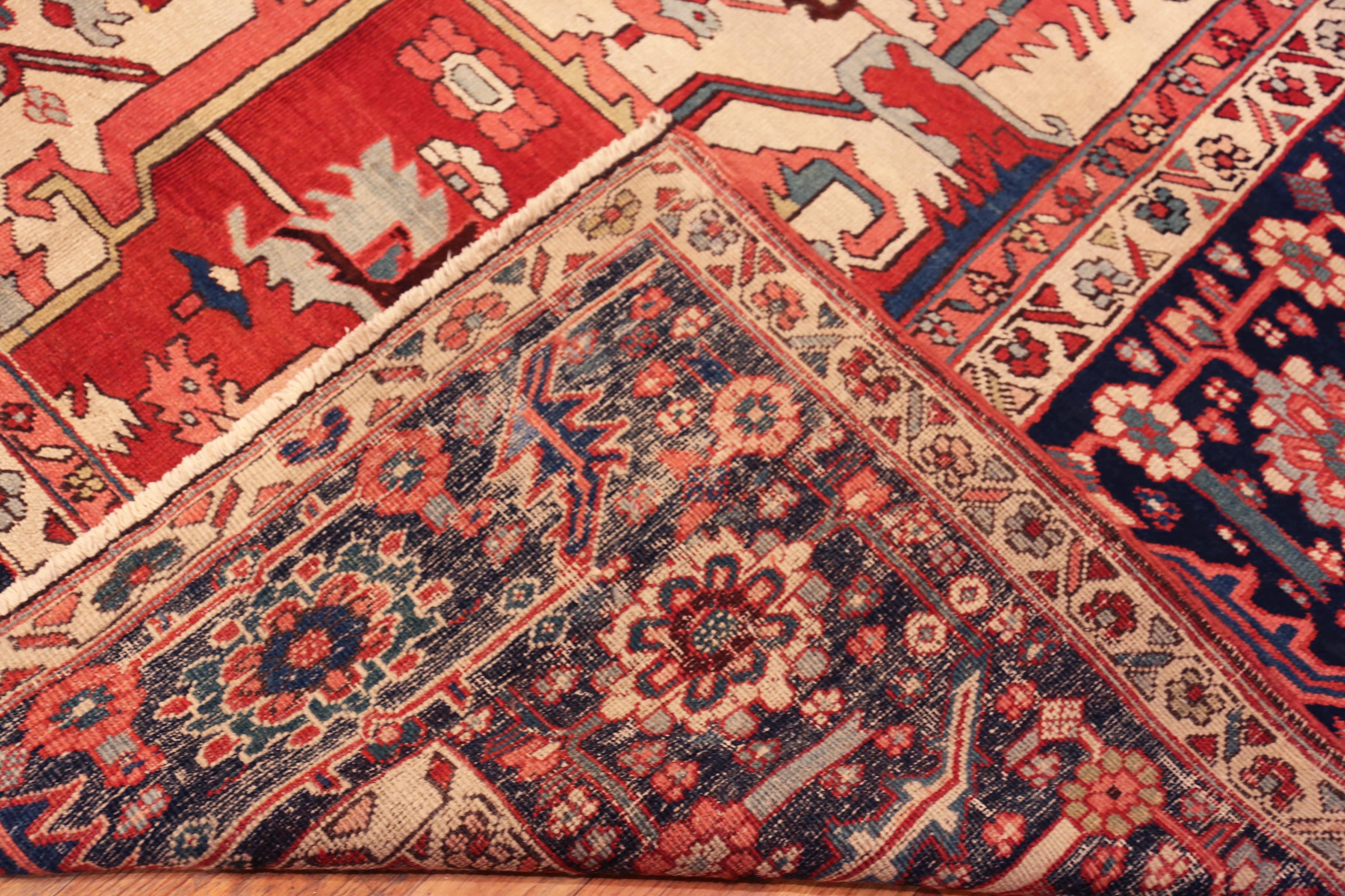 Masterfully Executed Large Antique Persian Heriz Serapi Rug, Country of origin: Persian Rugs, Circa date: 1900 - This large antique Persian Heriz Serapi rug exemplifies the powerful artistry of 19th-century village weaving from northwest Iran.