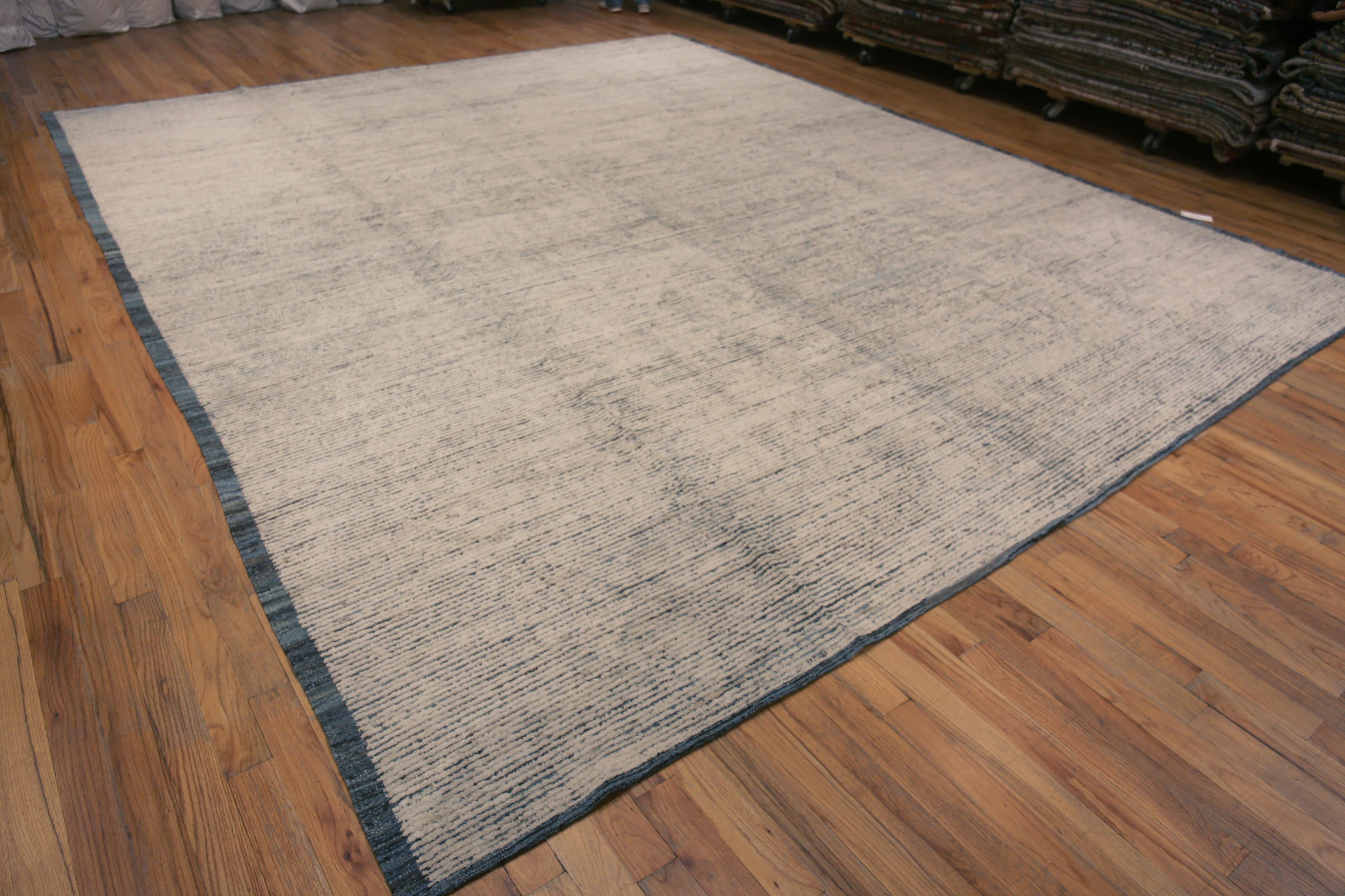 Decorative and Versatile Large Size Modern Solid Abstract Design Cream Color Wool Pile Area Rug, Country Of Origin: Central Asia, Circa Date: Modern Rug 